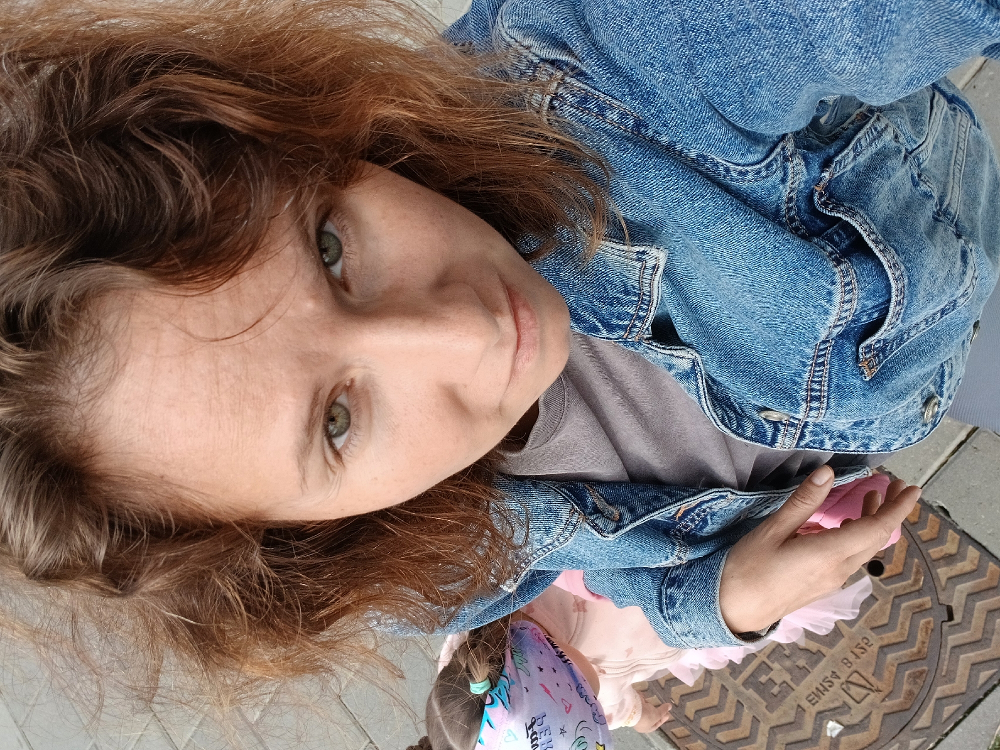 Selfies and street life near a Yekaterinburg apartment block
