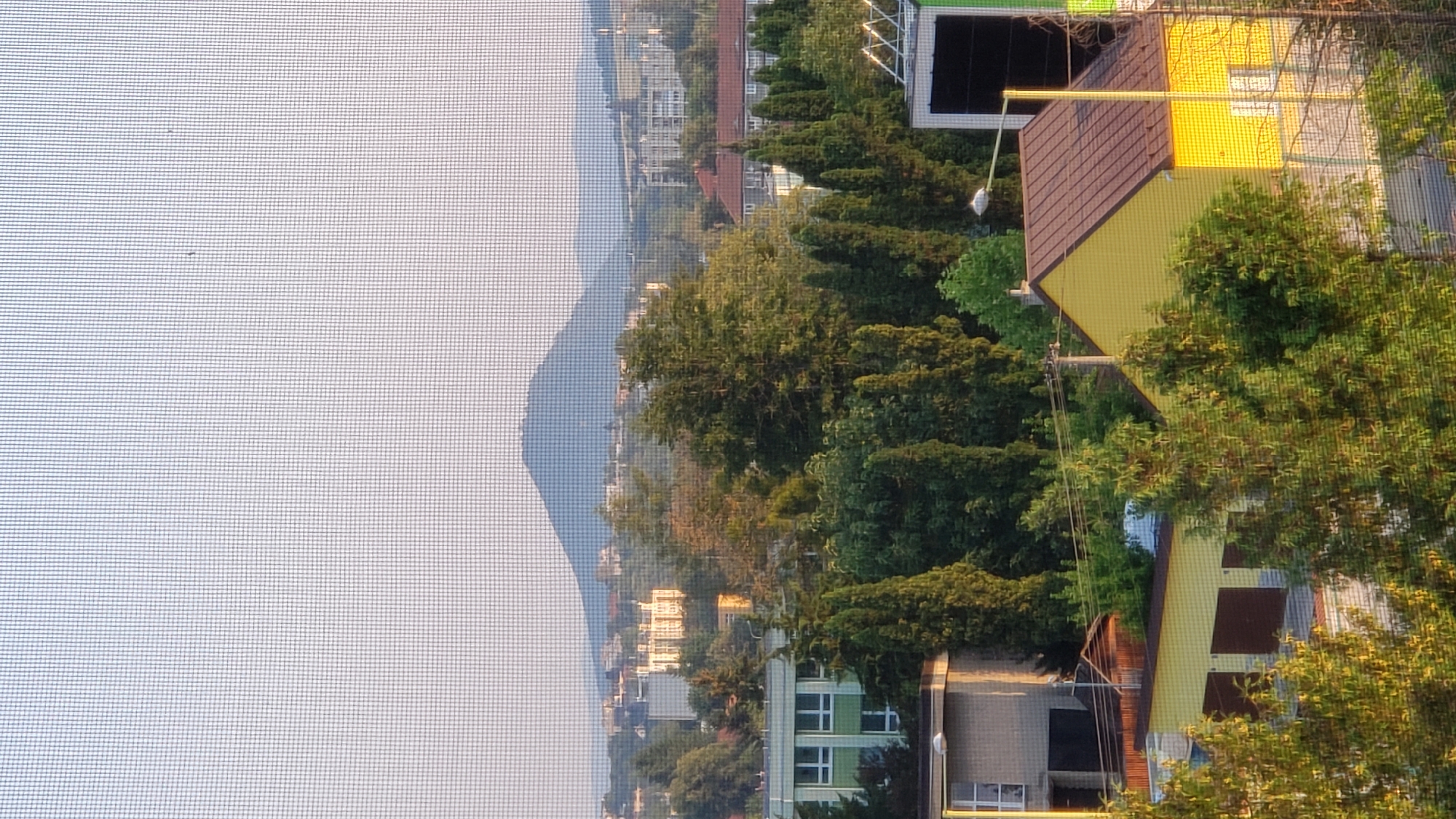 Rooftop views across Prešov neighborhoods at dawn