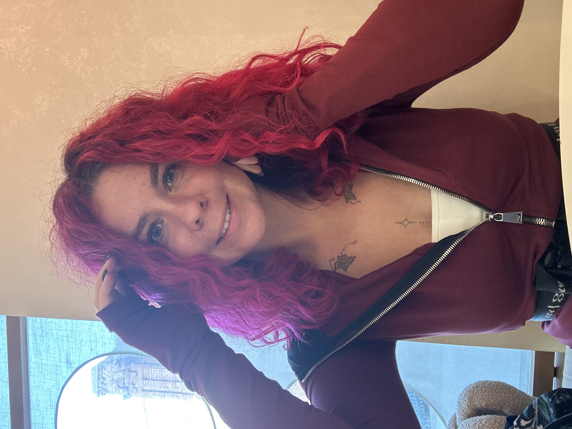 Red-haired woman photographed twice in Novosibirsk indoor locations