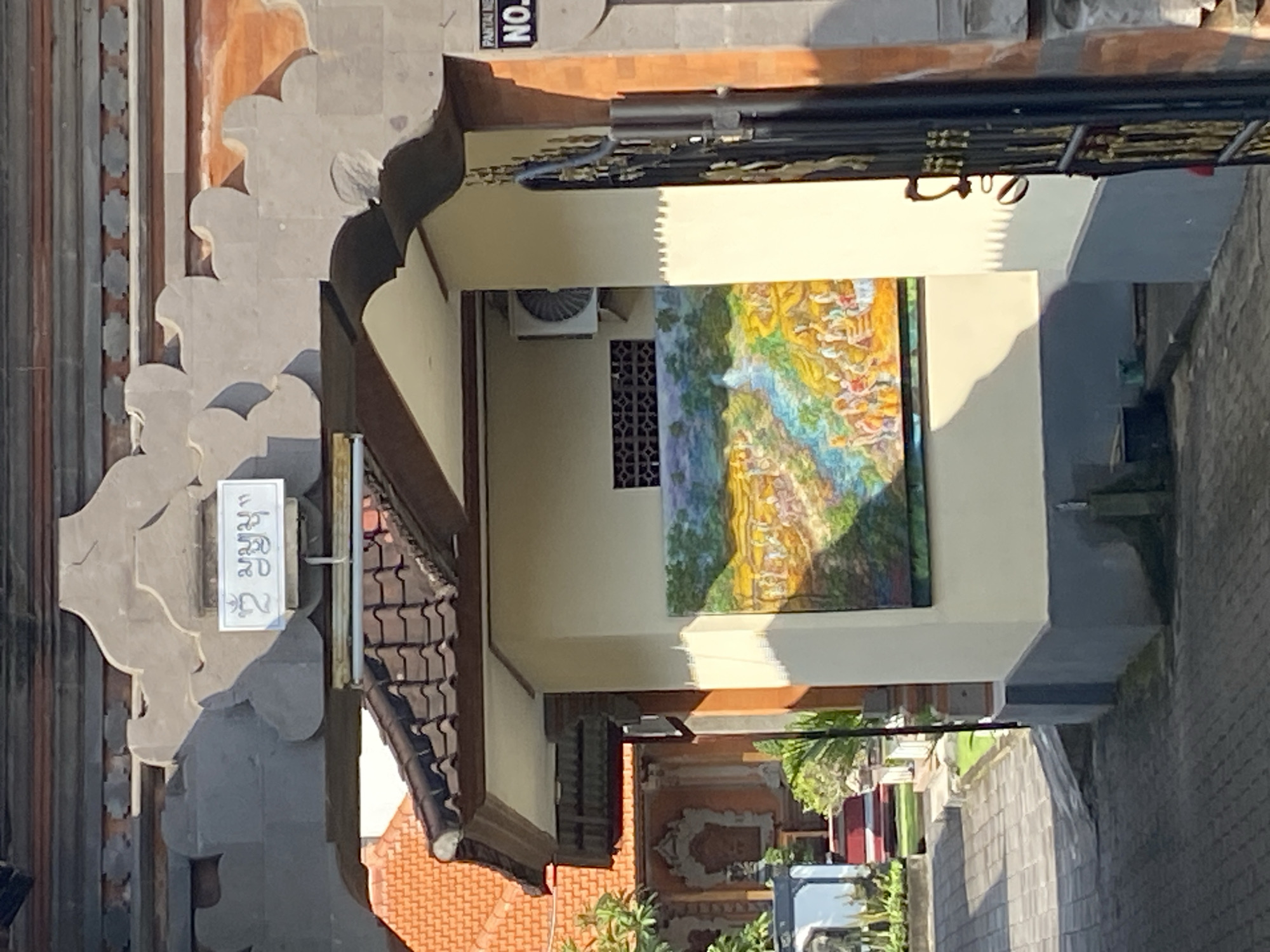 Tourist browsing Balinese crafts and culture in Nusa Dua