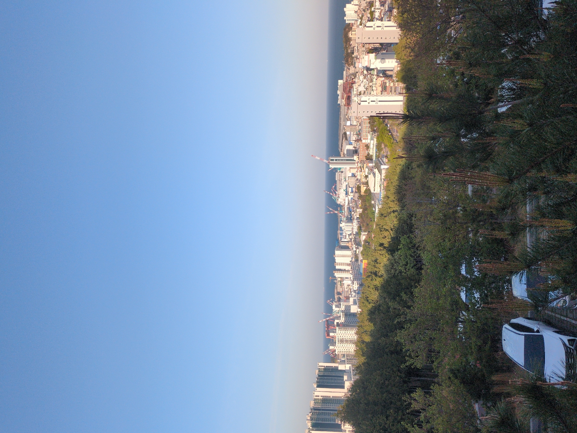 Clear morning skies captured over Ulsan cityscape from elevated viewpoint