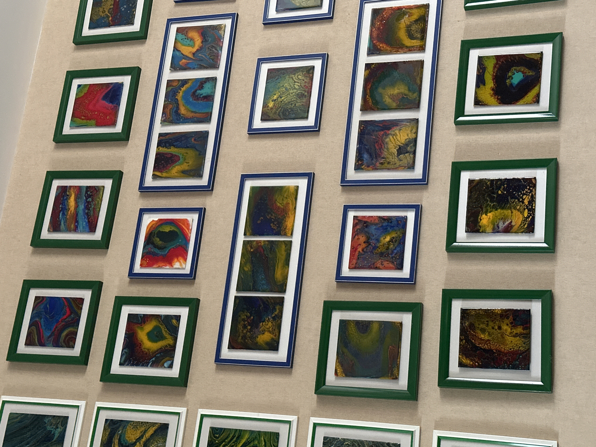 Fluid abstract art collection displayed at home, with everyday moments