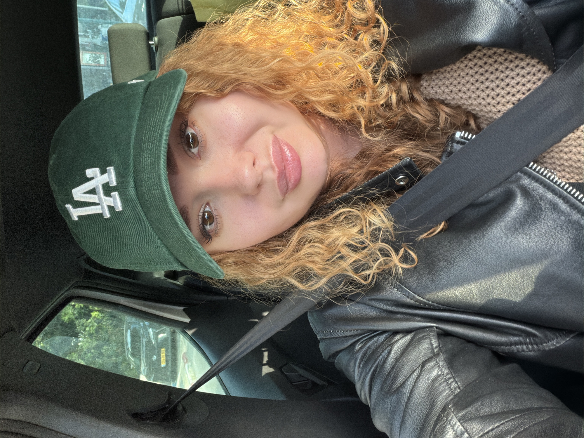 Person in LA cap spotted in car in Tel Aviv