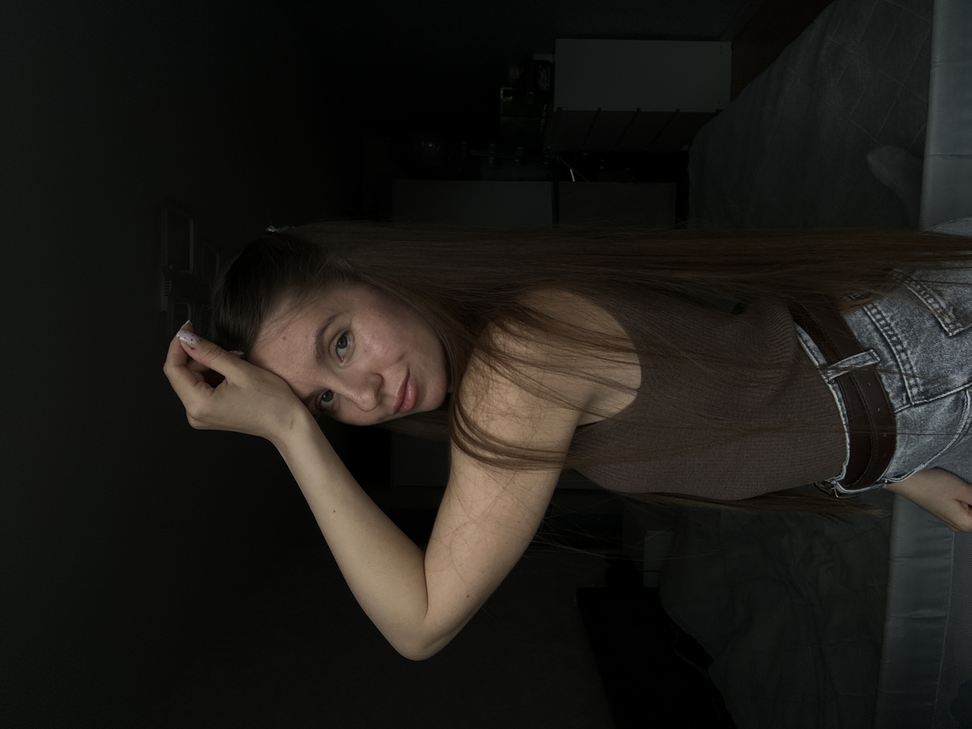Woman photographed indoors in Klin, Russia apartment setting