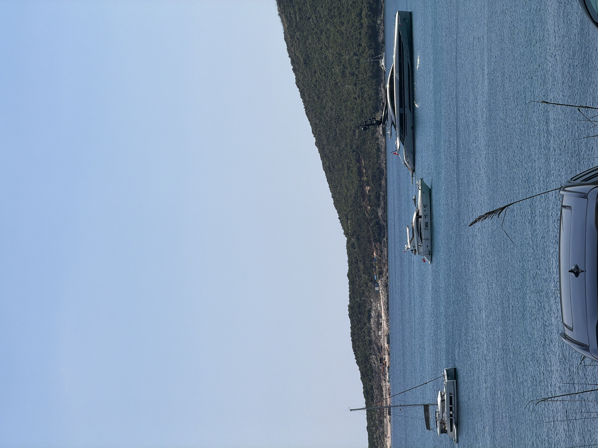 Yachts and calm blue water off the Montenegrin coast