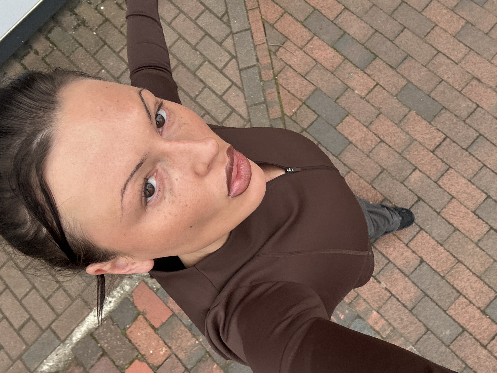 Person photographed on brick walkway in Tunbridge Wells