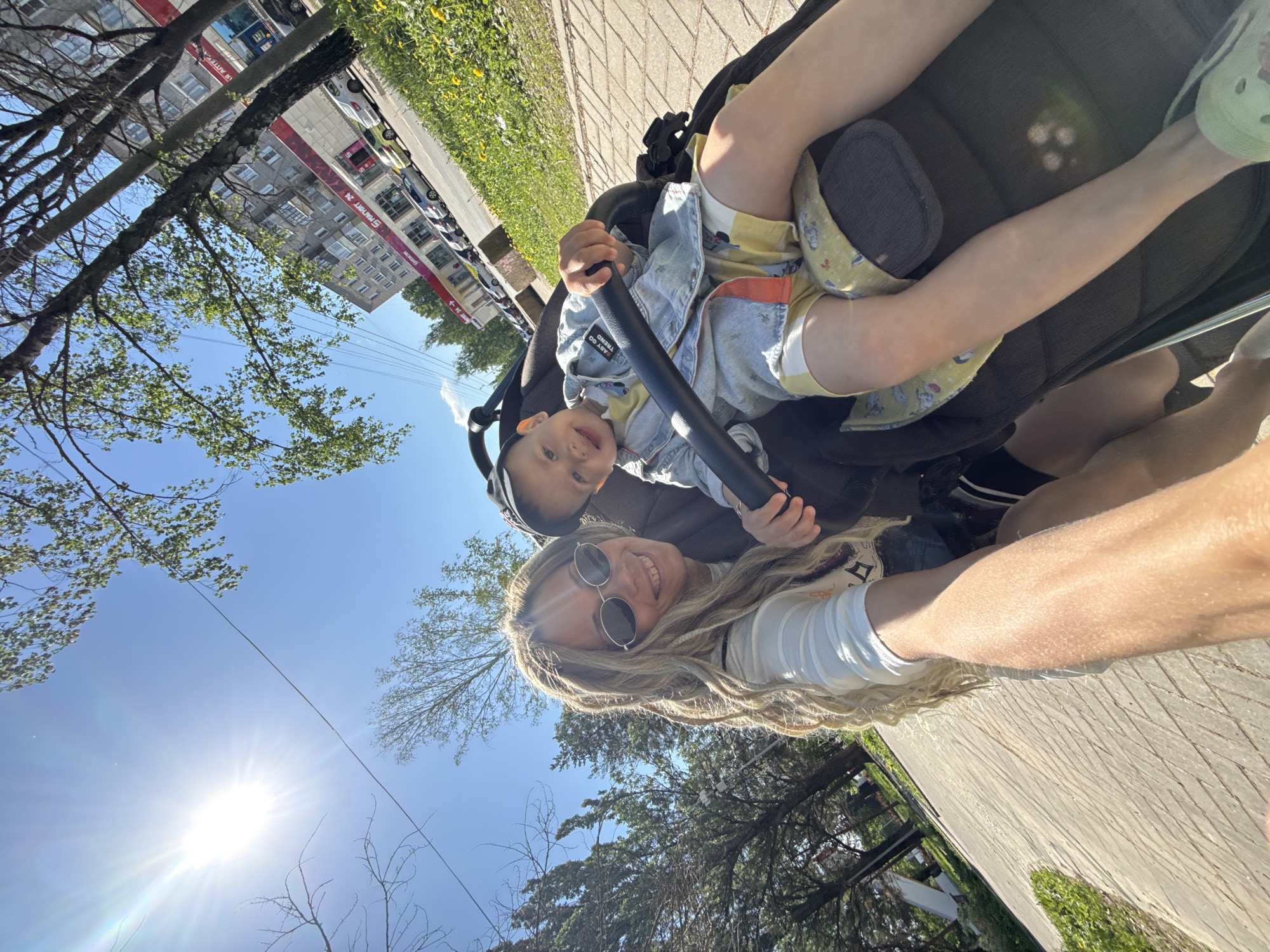Morning park outing features mother, baby, and playground activity