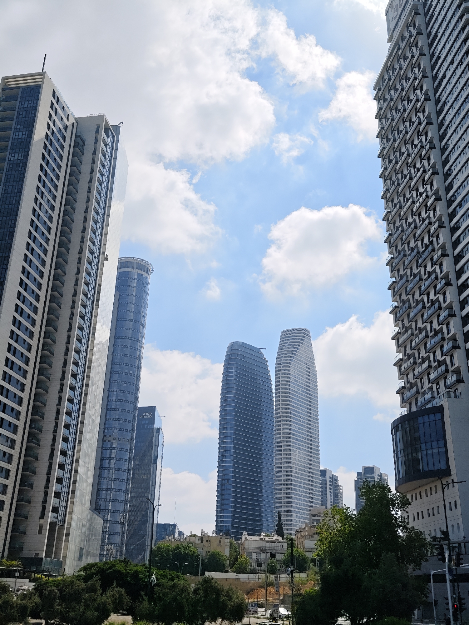 Tel Aviv–Givatayim high-rise construction and skyline, summer morning
