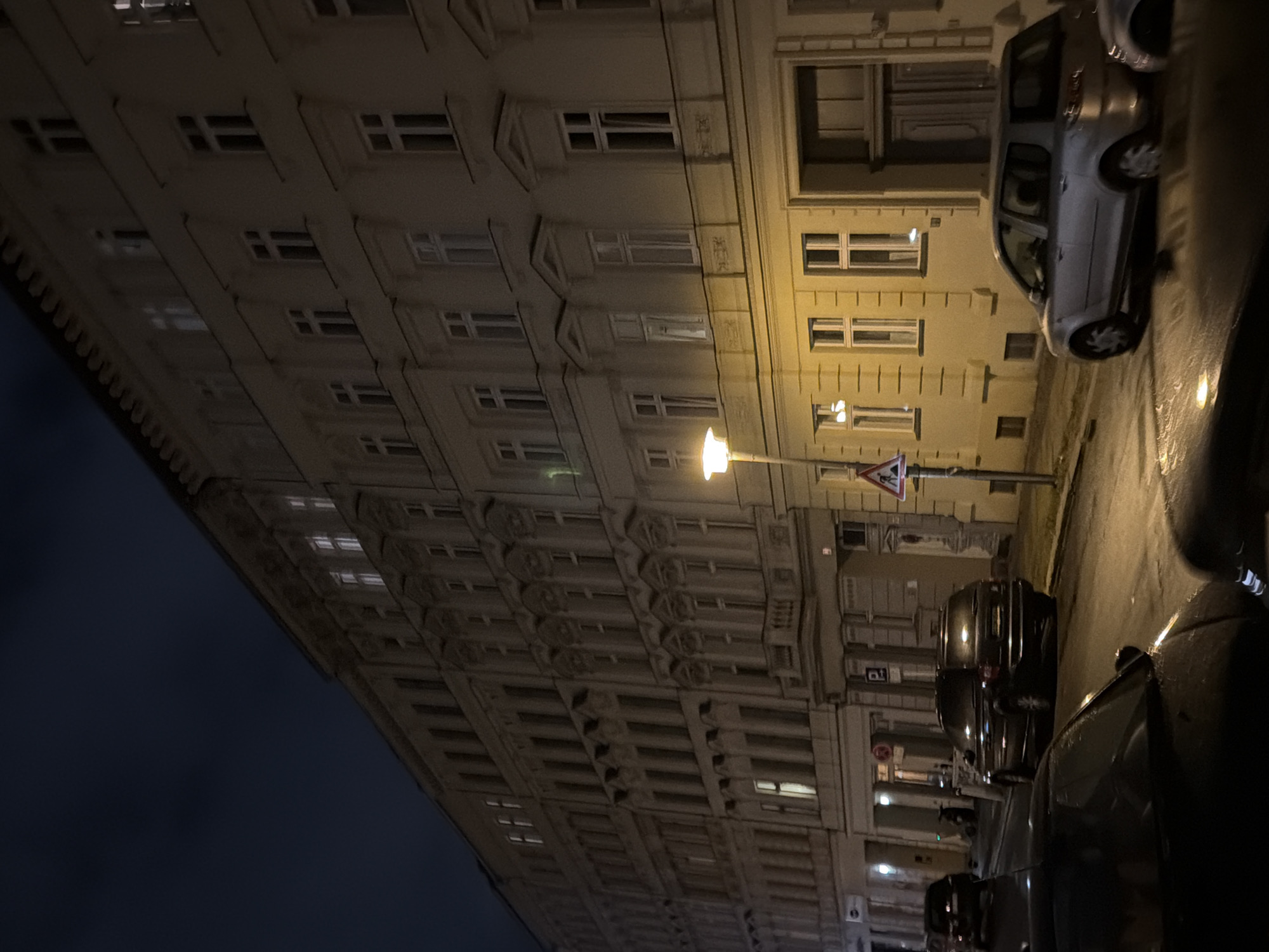 Berlin streets after dark, ornate facades and city movement