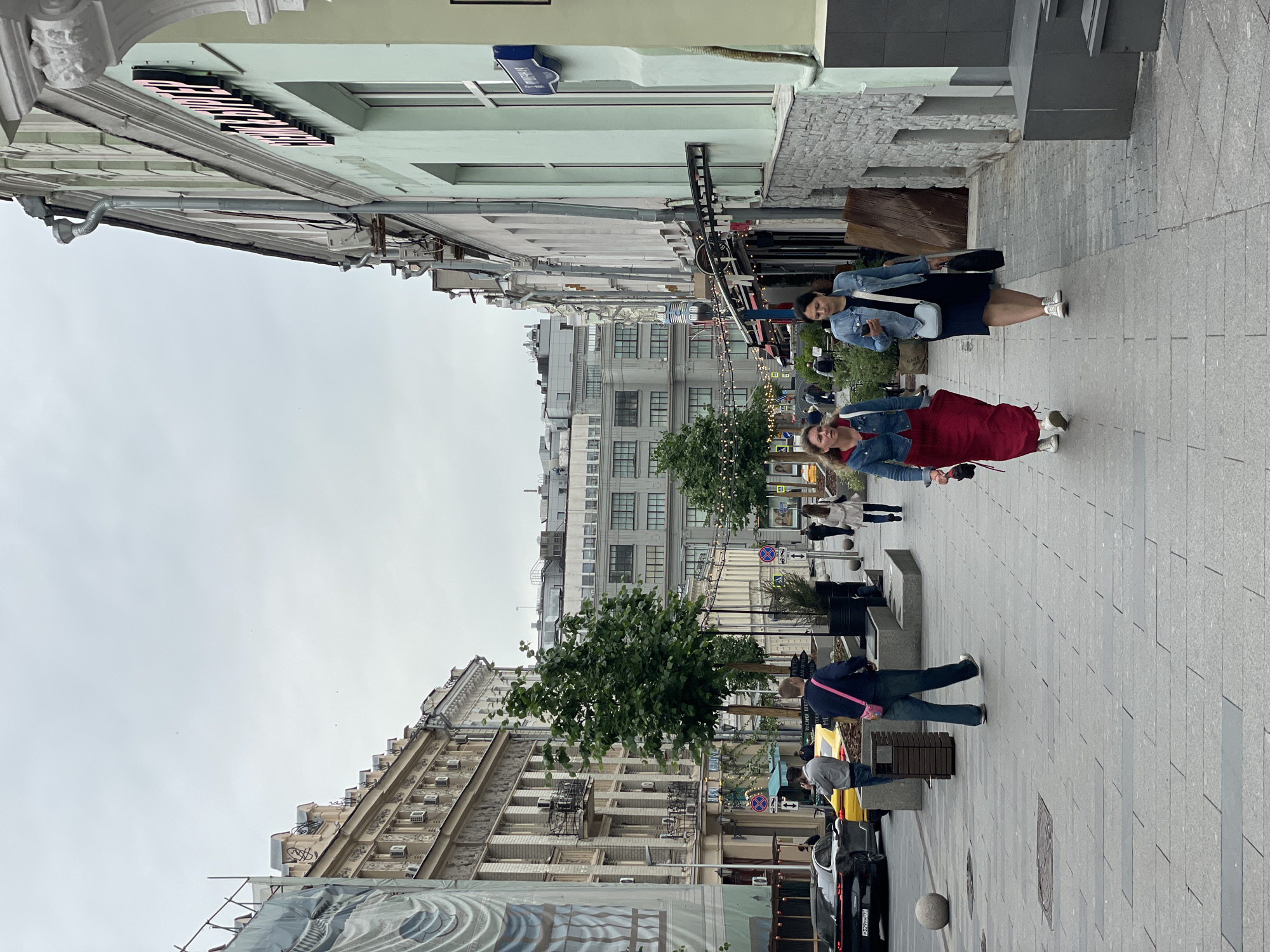 Pedestrian street scene in central Moscow on a cloudy morning