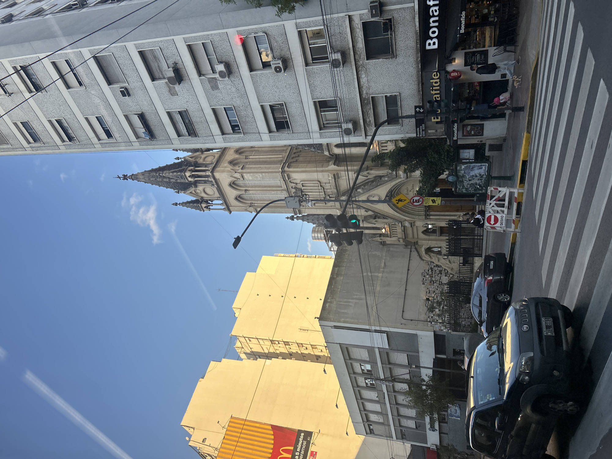 Buenos Aires street scene features neo-Gothic basilica architecture