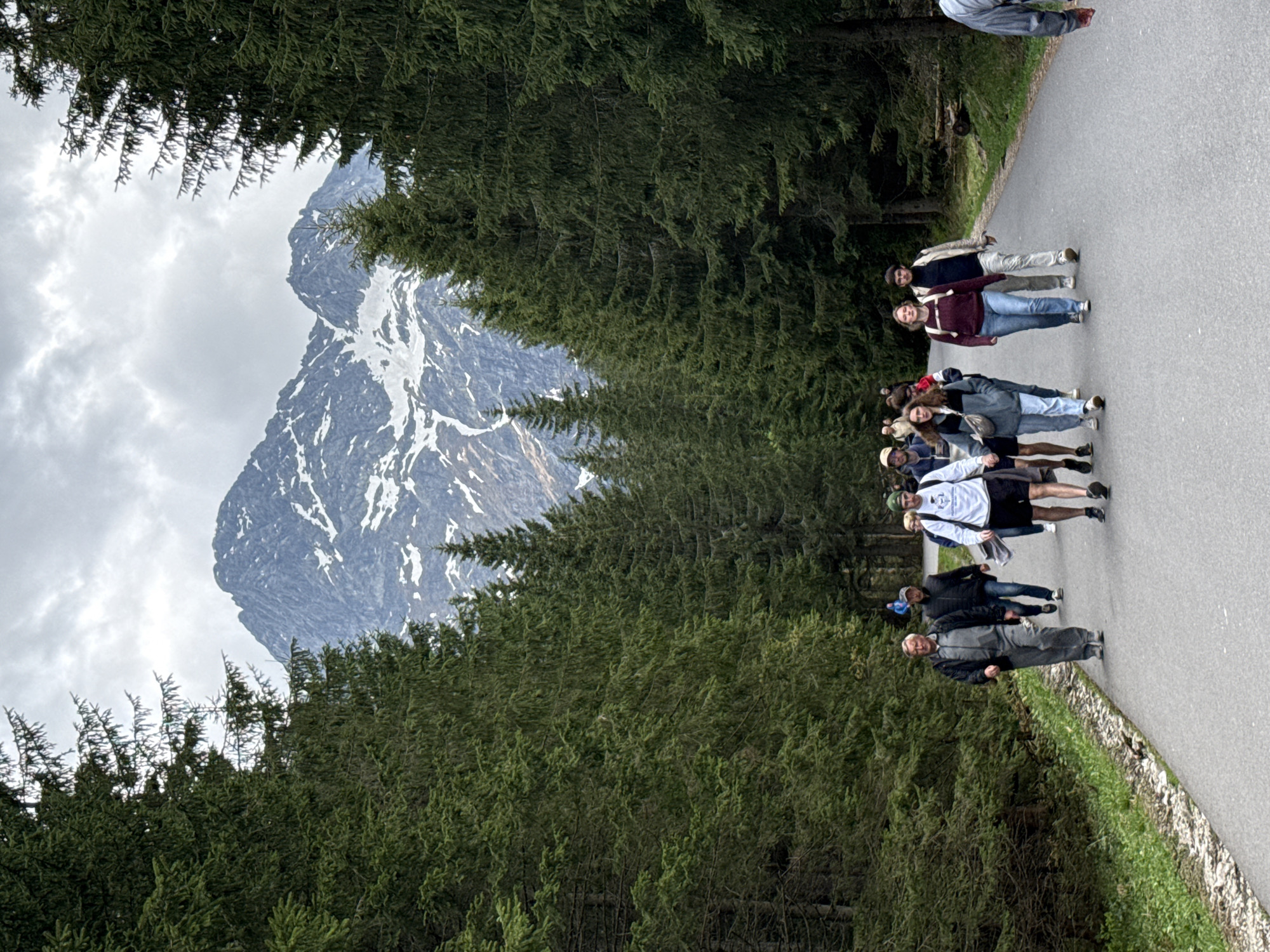 Group takes mountain walking tour in Brzegi, Poland