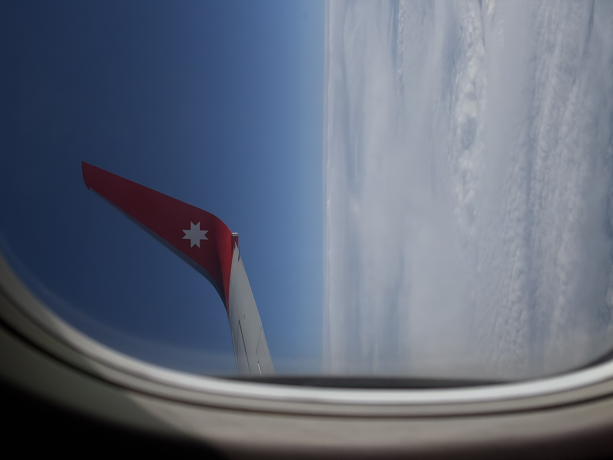 Aircraft wing with star emblem photographed over Domodedovo