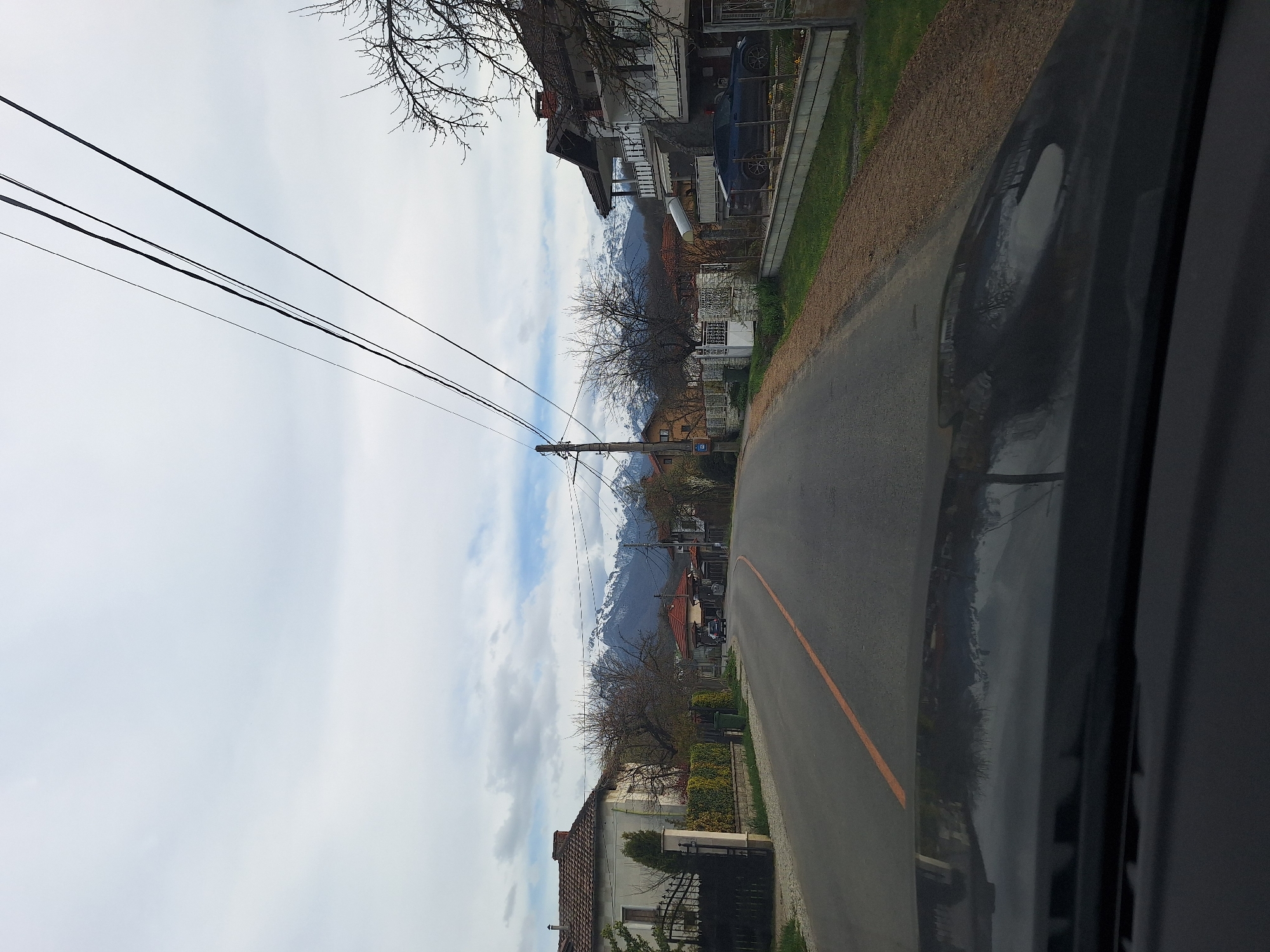 Residential street documented in Apriltsi, Bulgaria with mountain views