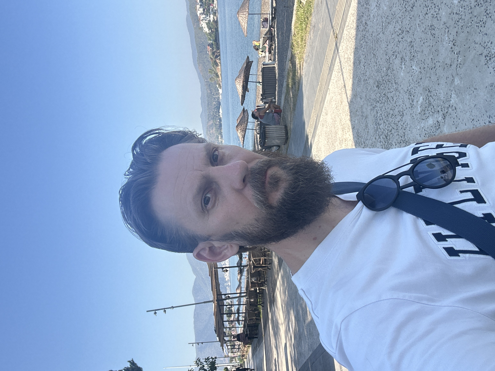 Sunny morning on the Fethiye coast — beach, boards, and selfies
