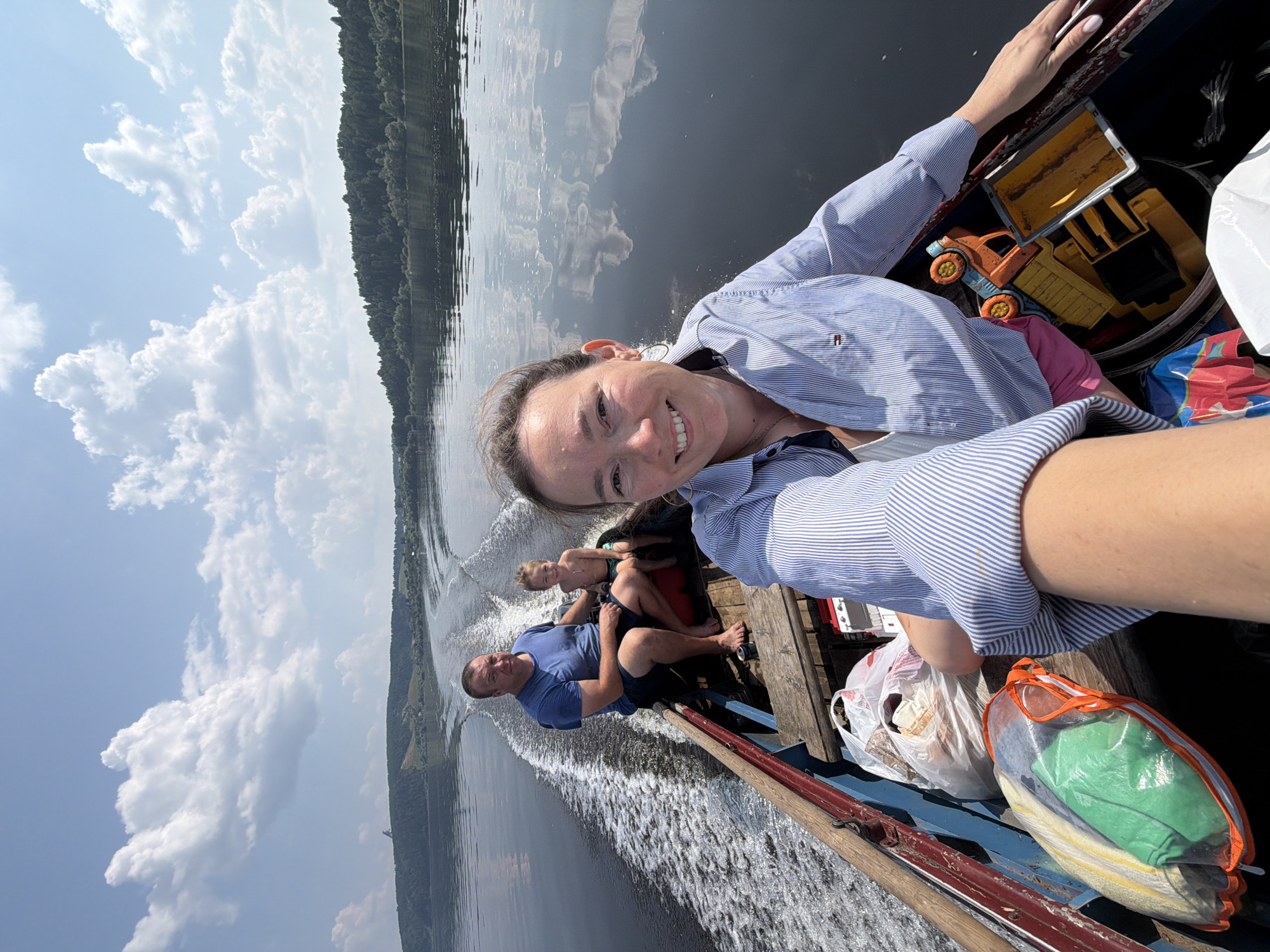 Boat ride on a calm Russian lake on a sunny morning