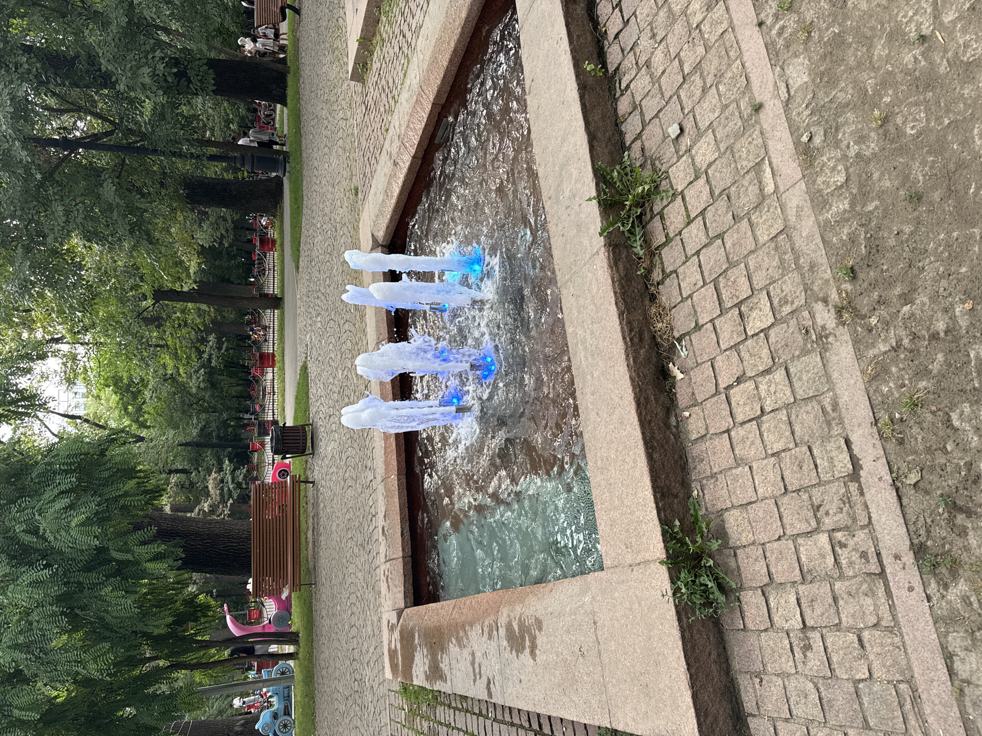 Almaty park afternoon: fountains, go-karts, treehouses, and trails