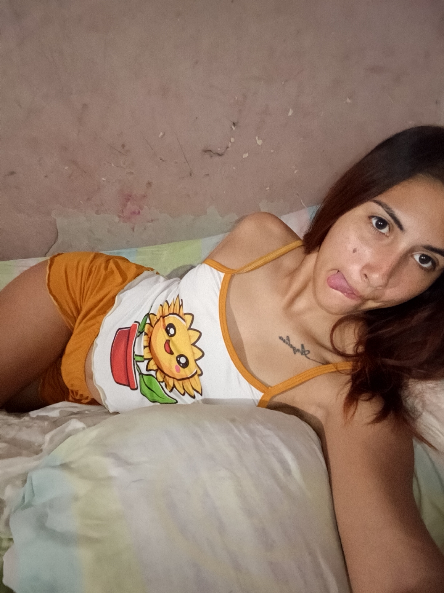 Woman Takes Extended Selfie Session in Venezuelan Bedroom