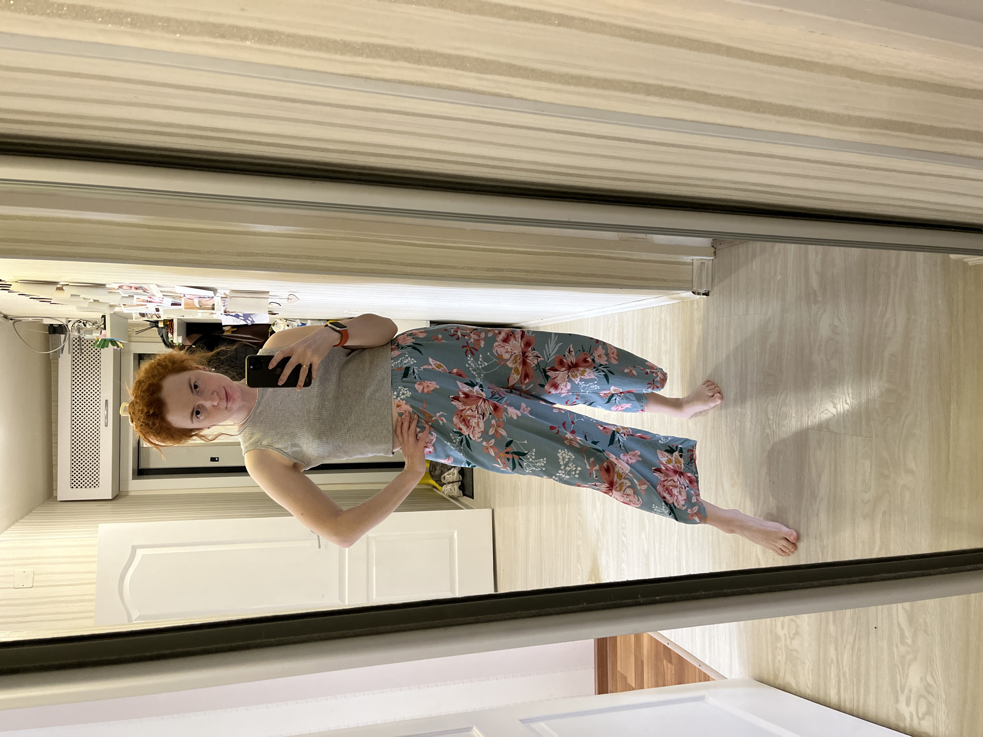 Woman documents hair salon visit, cat lounges in Chaikovsky