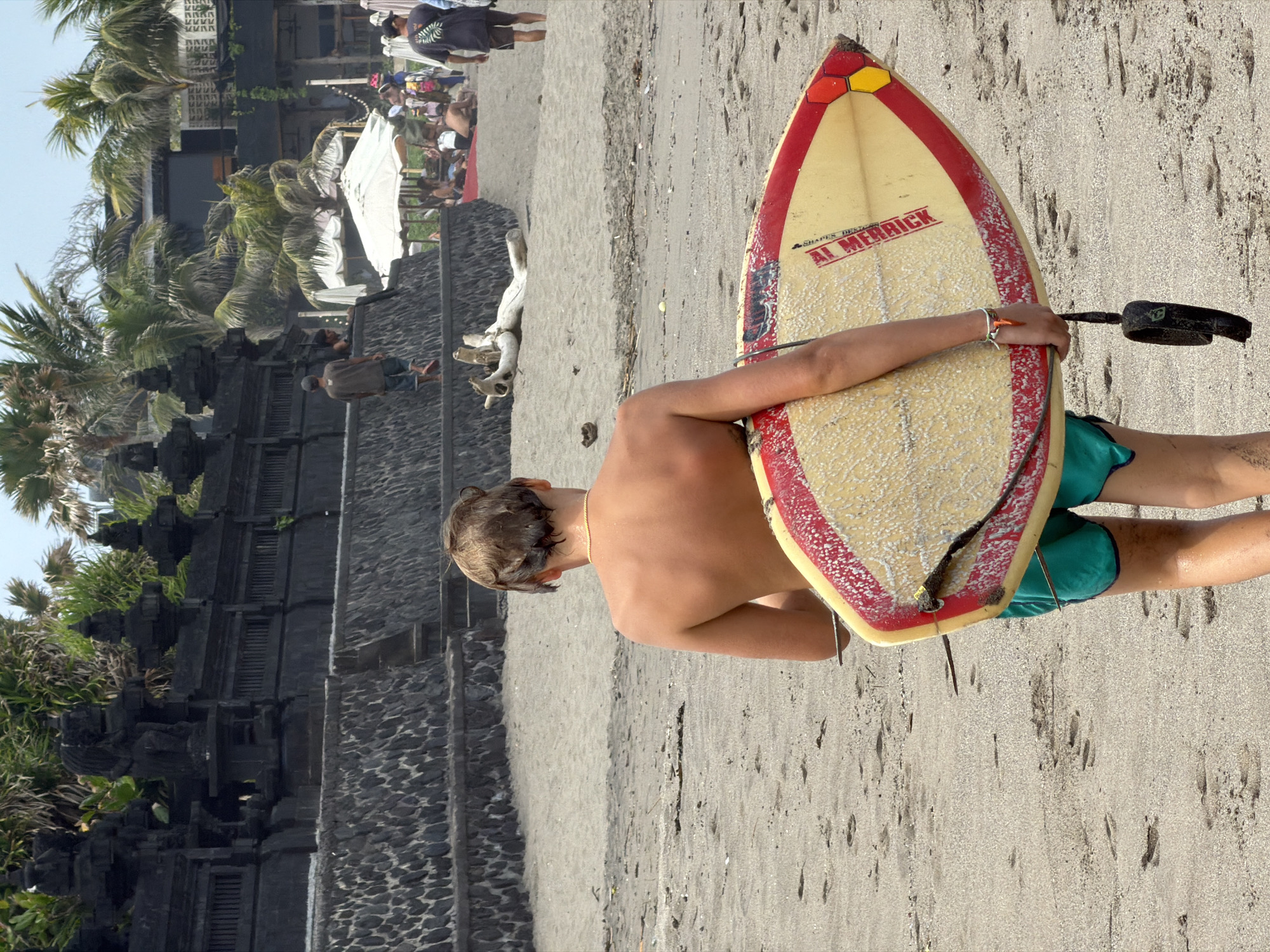 Early morning surf and café scene along North Kuta beach