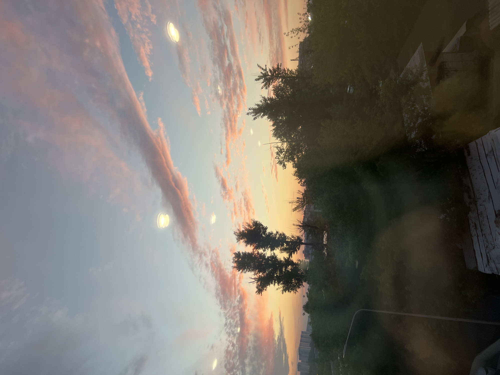 Vivid pink and orange sunset fills the Irkutsk sky