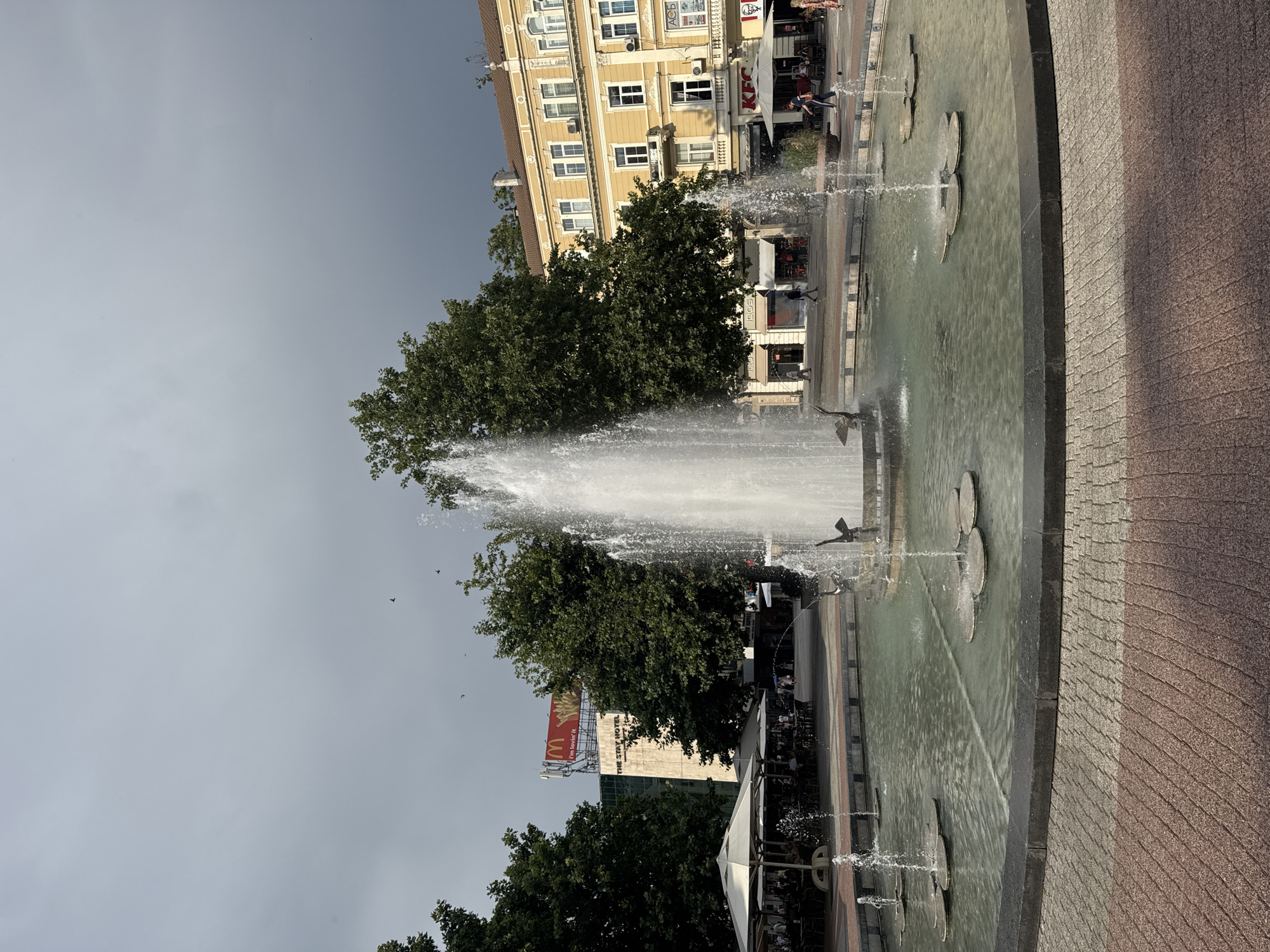 Afternoon in Plovdiv's city center around a fountain square