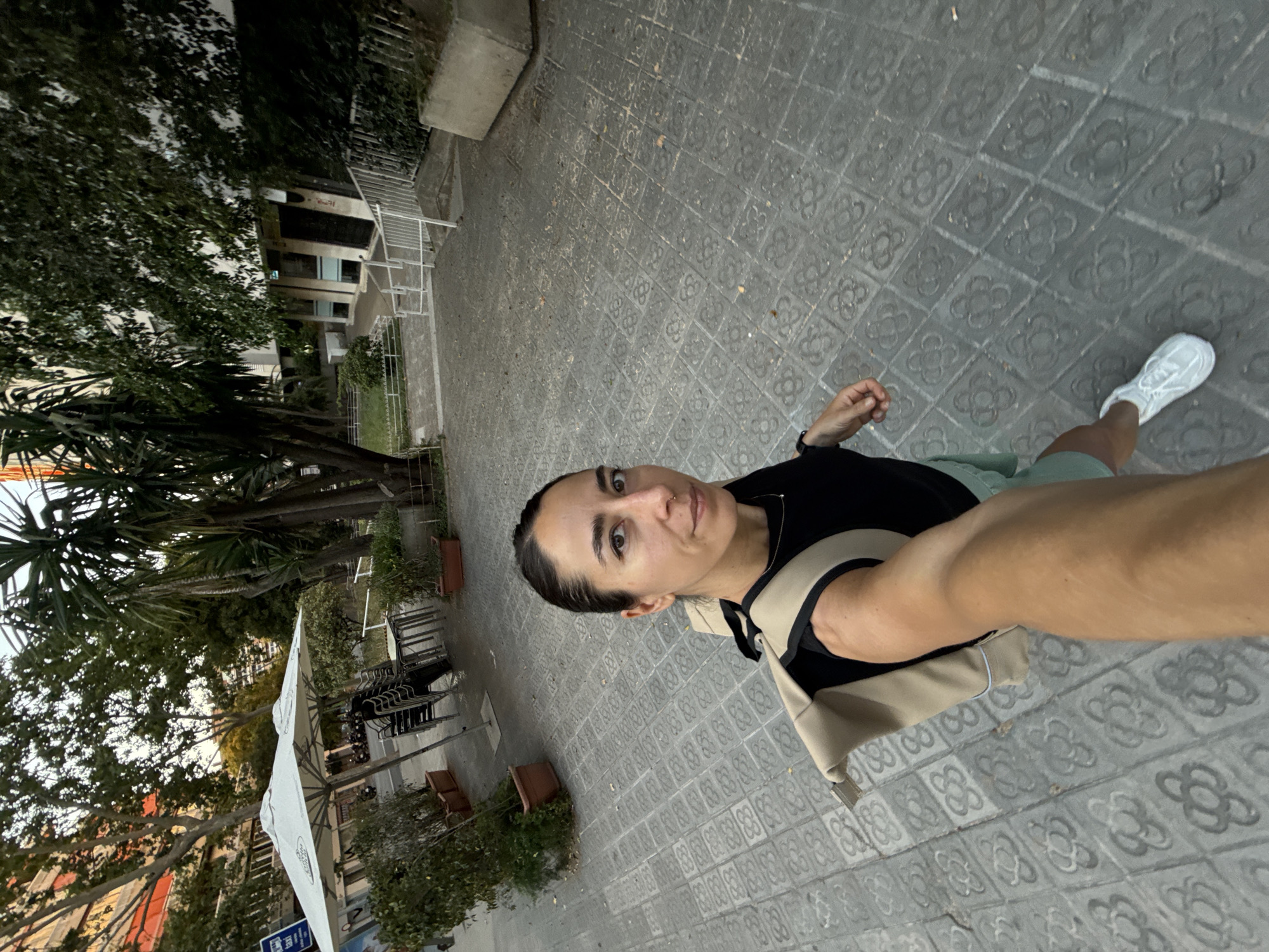 Selfie walk through Barcelona's tree-lined cobblestone streets