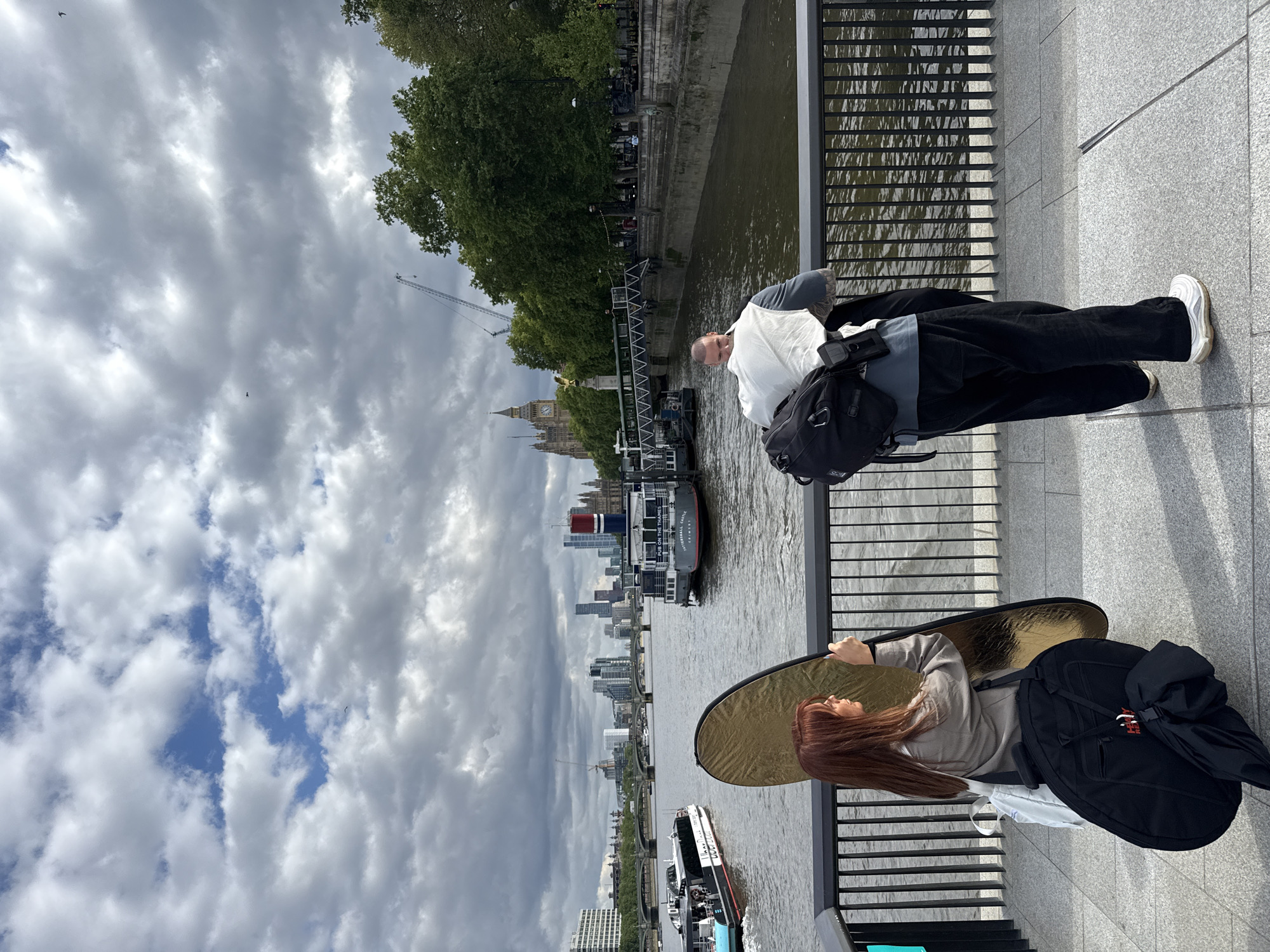 Two people spotted by Thames railing in London