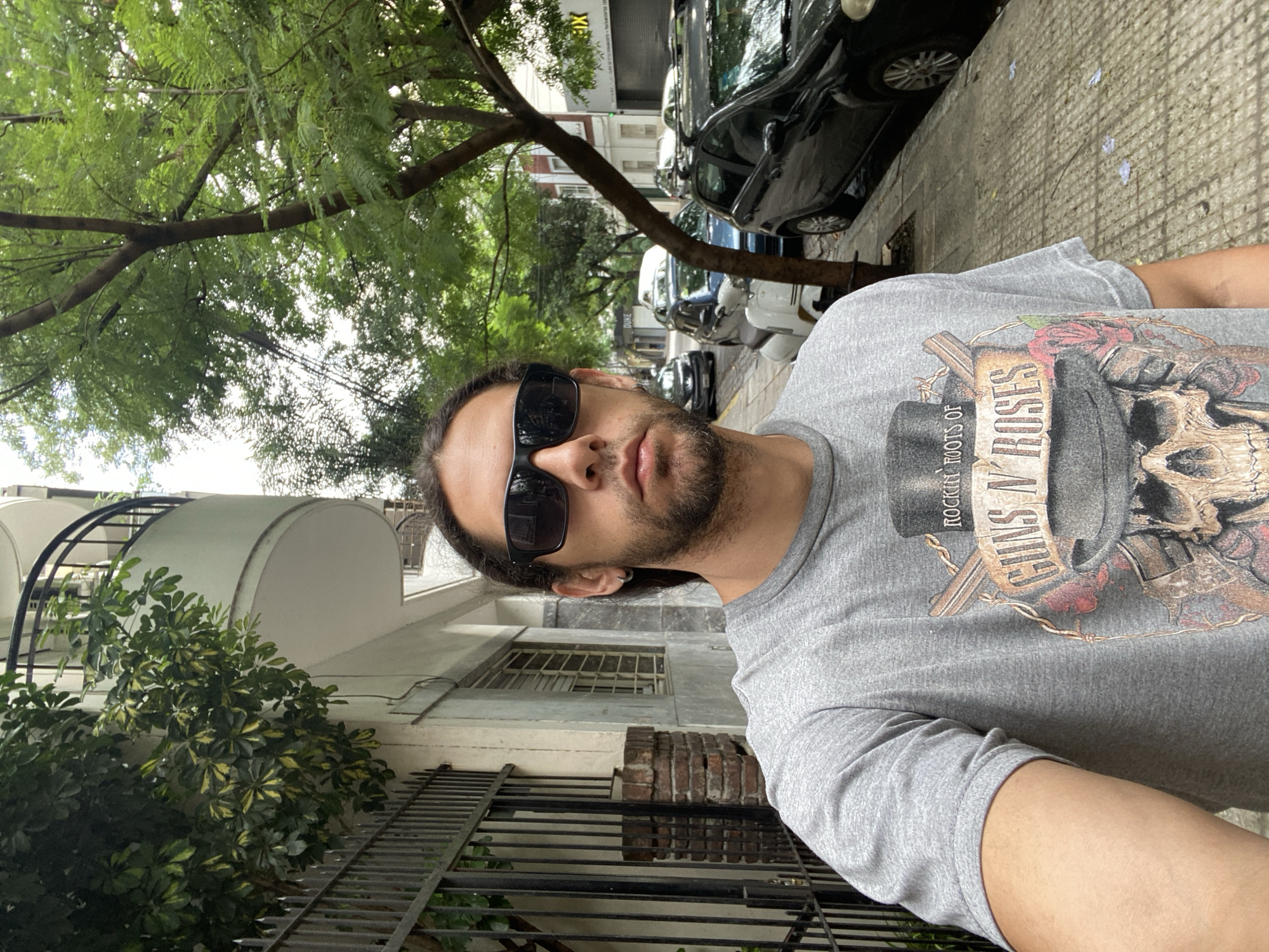 Tourist takes selfie on Buenos Aires sidewalk
