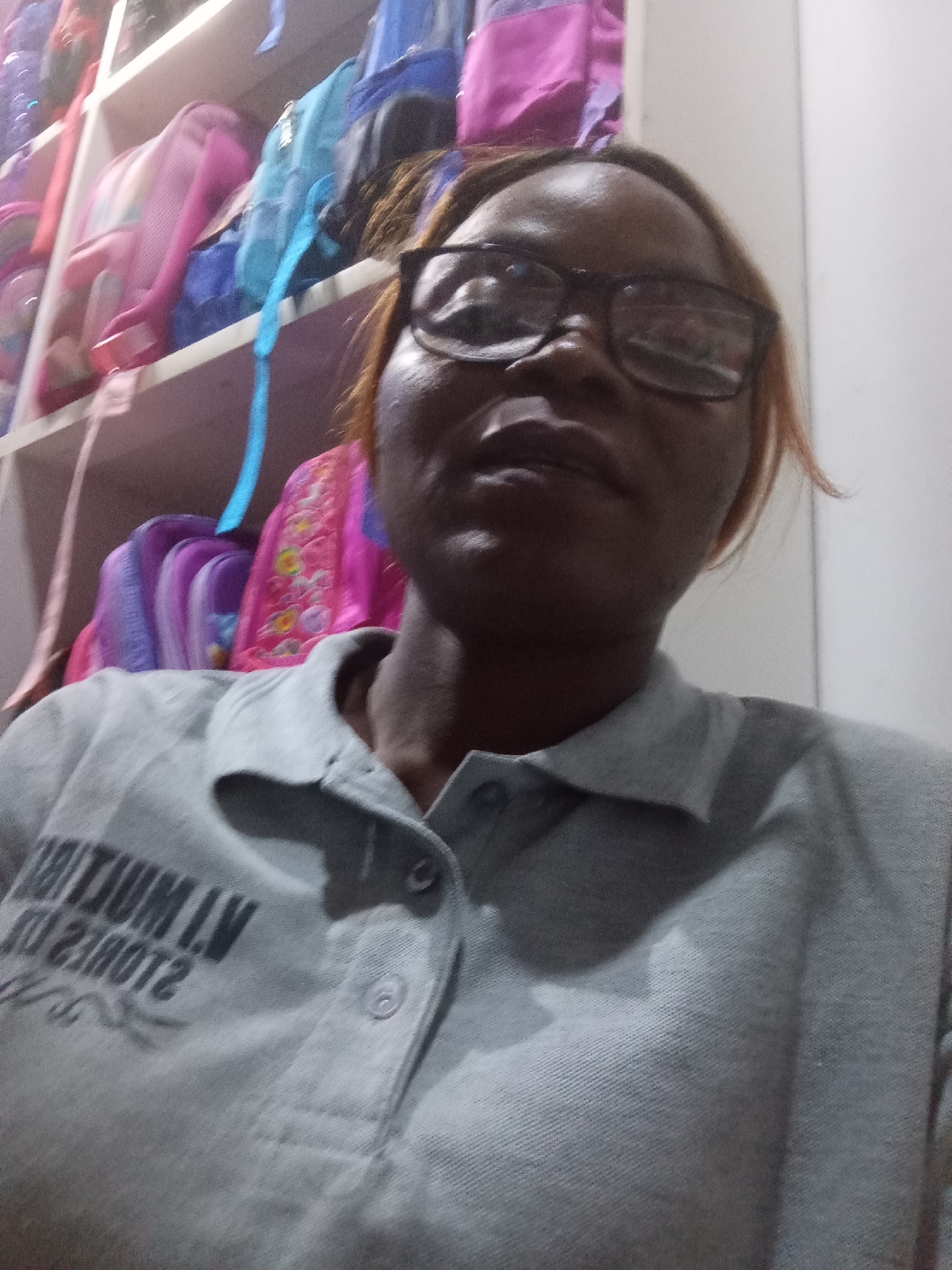 Selfies in a backpack shop, Howayi, Nigeria