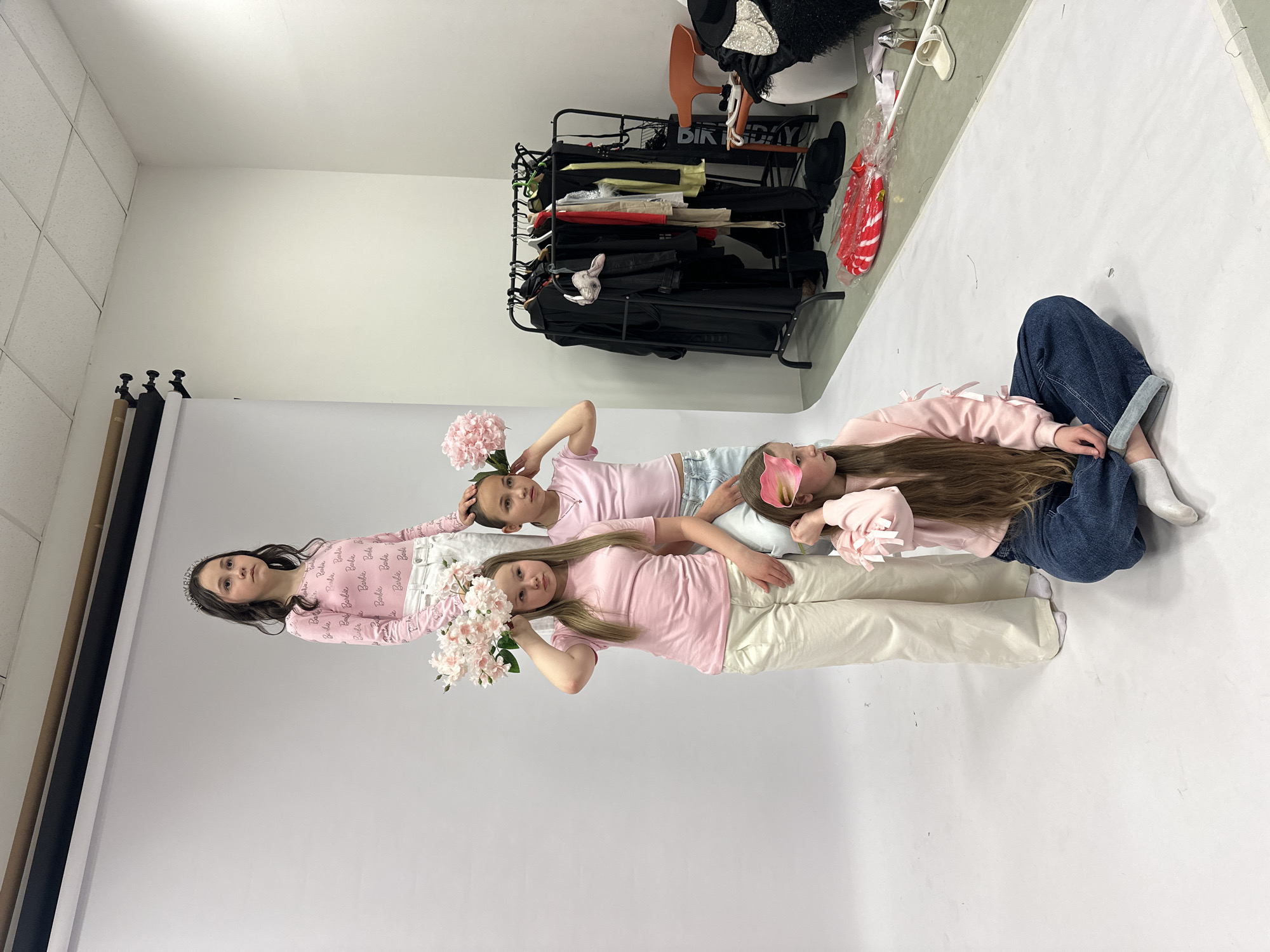 Girls in pink pose for studio photos in Votkinsk