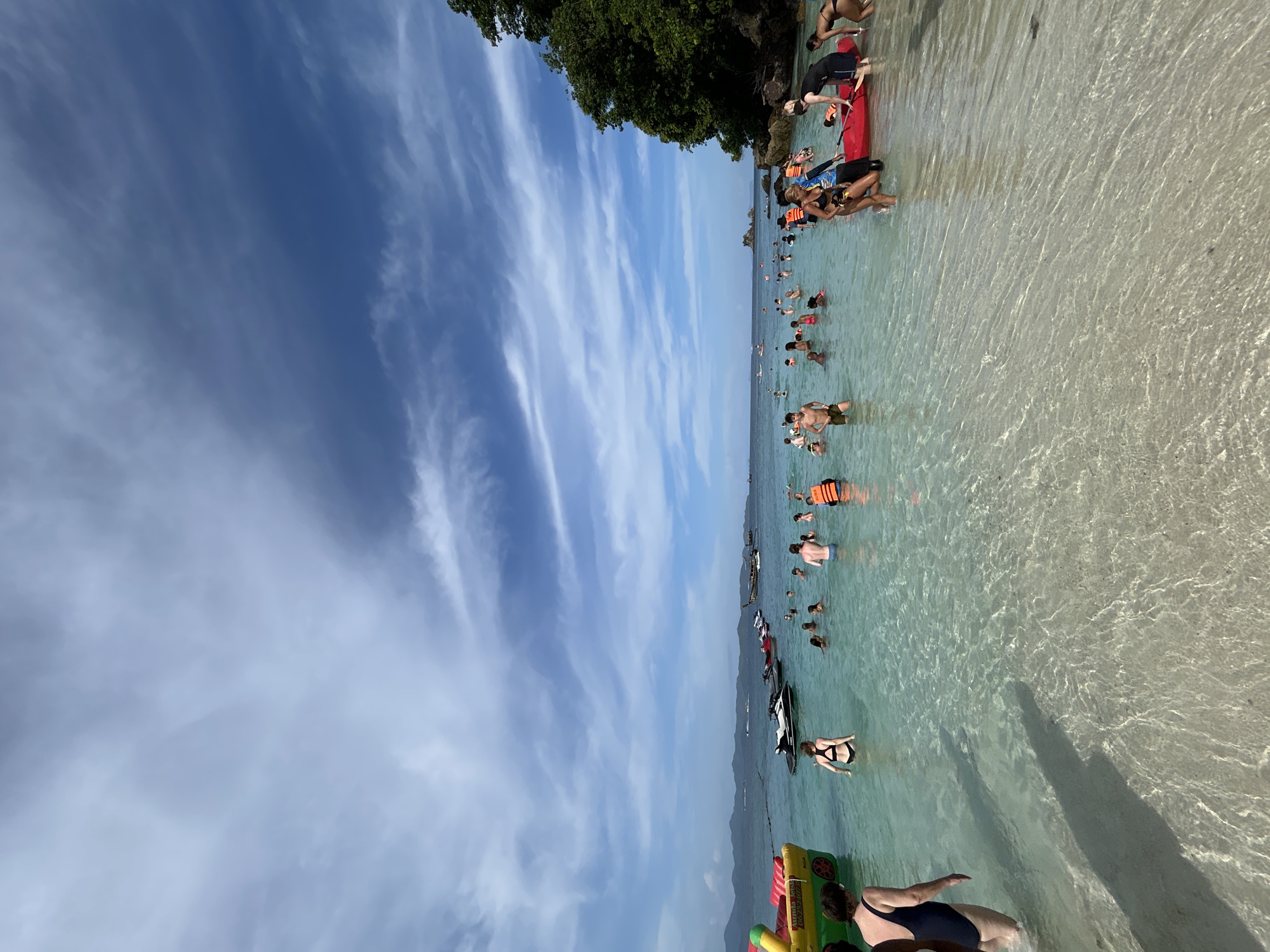 Crowded beach day at Phru Nai with water sports in full swing