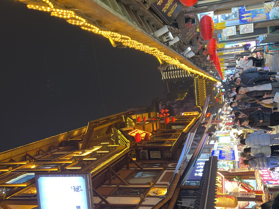 Evening crowds gather at Hongyadong Commercial Street, Chongqing