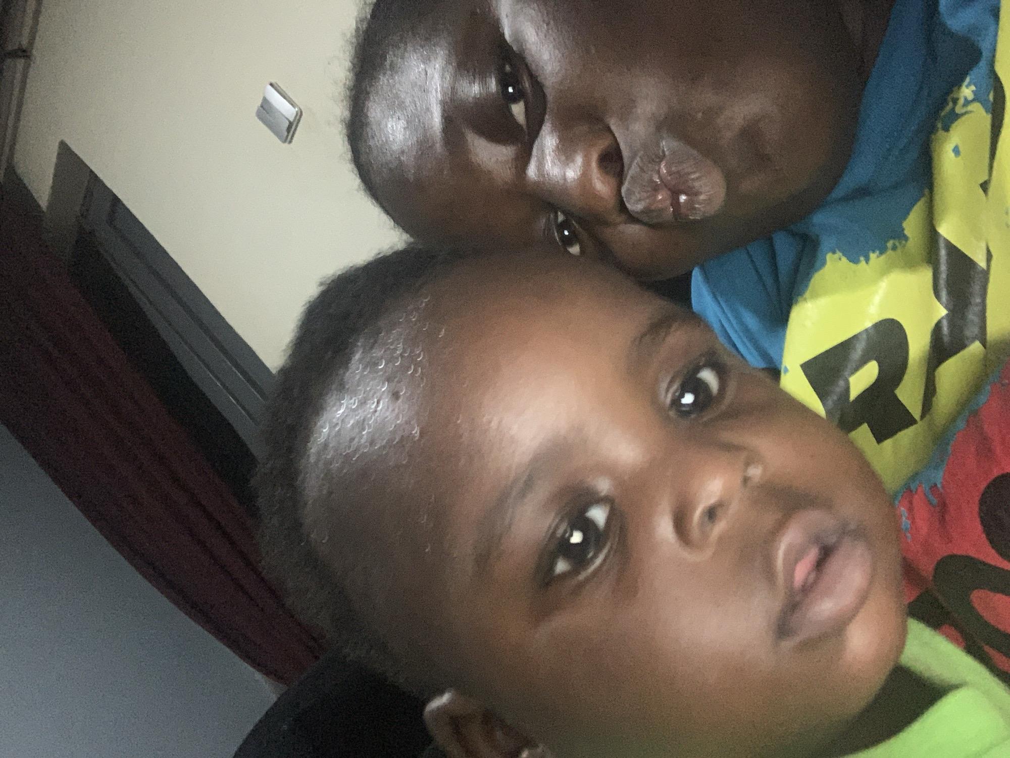 Living room hangout with selfies, group moments, and a crawling toddler