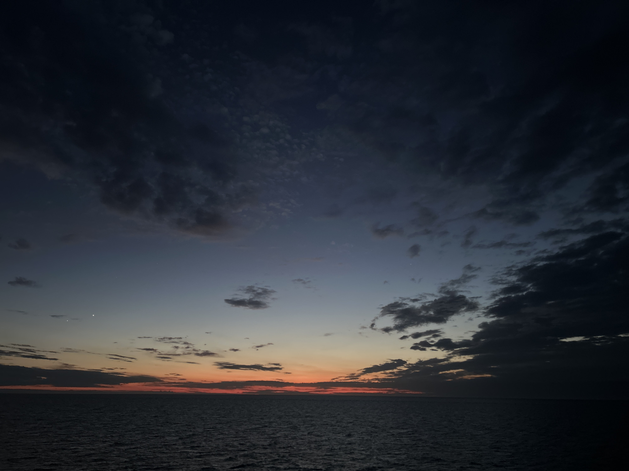 Twilight sky documented over water near Baltic Sea