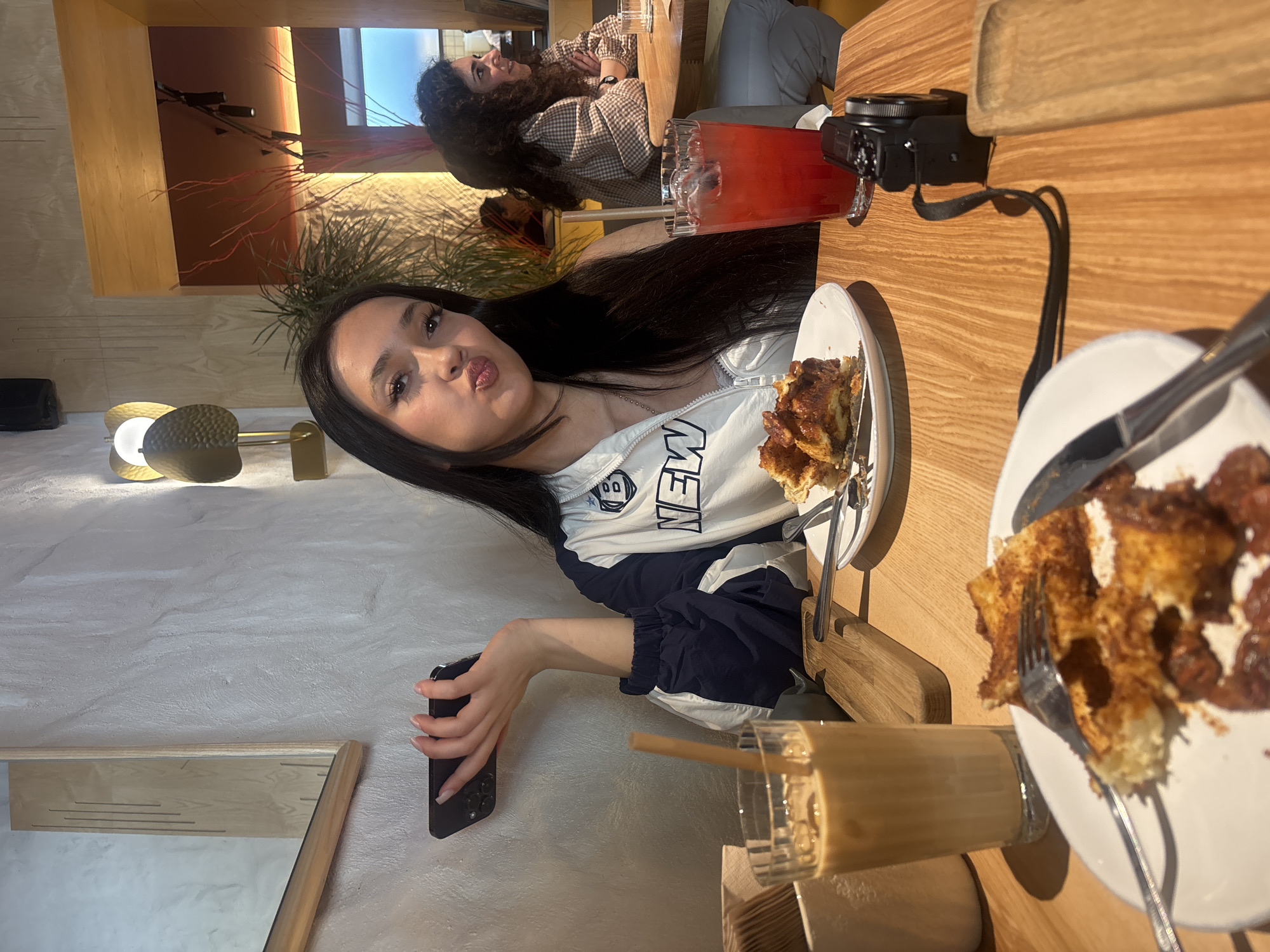 Woman documents leisurely breakfast outing at Yerevan cafe