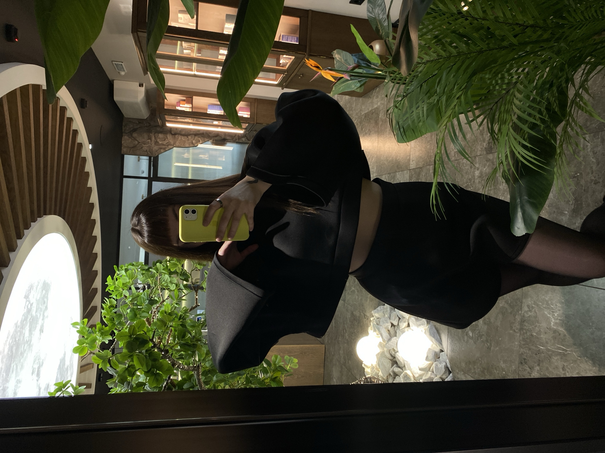 Woman takes morning selfies in decorated Votkinsk interior