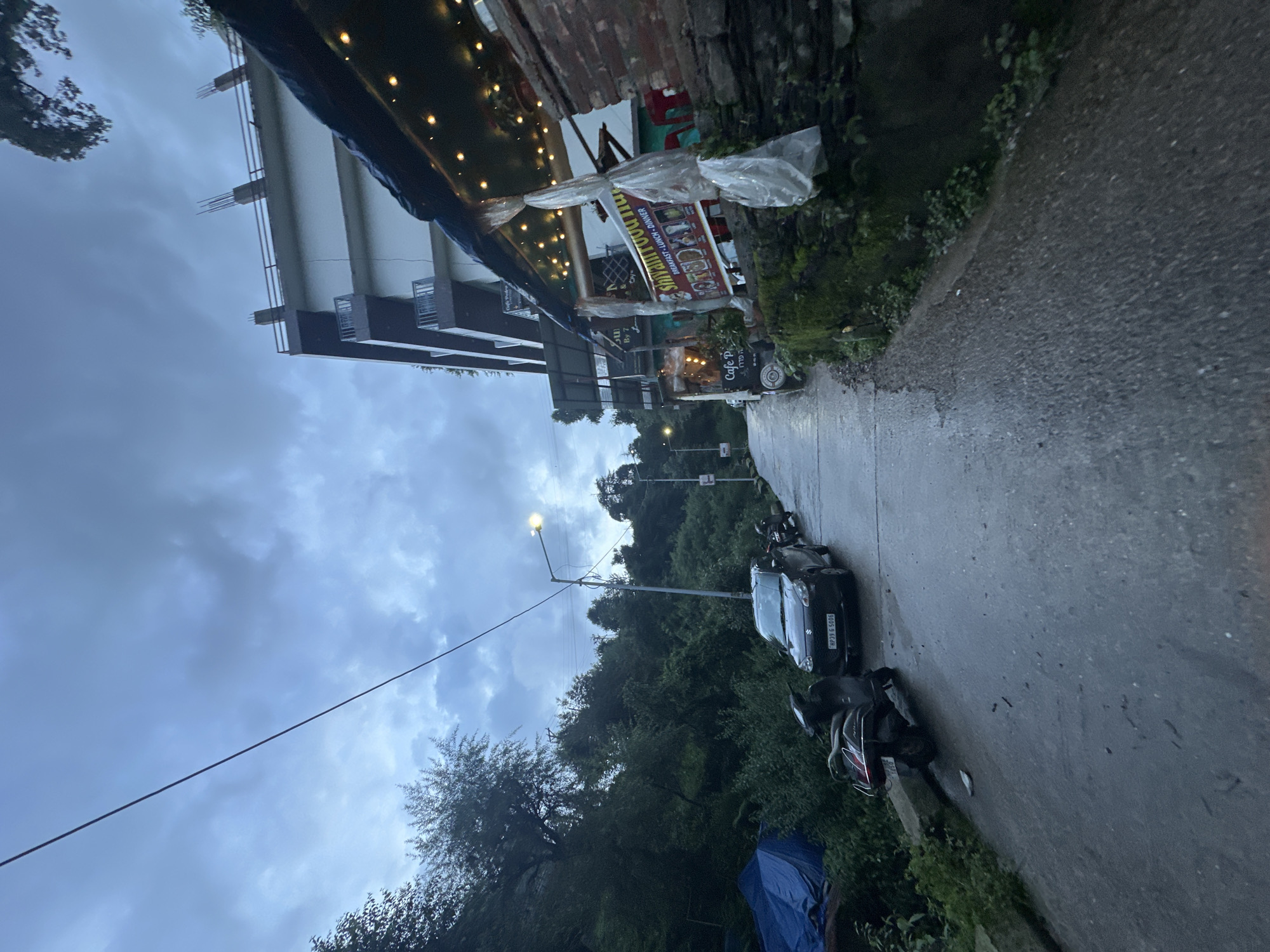Group outing on a rainy Himalayan hillside trail