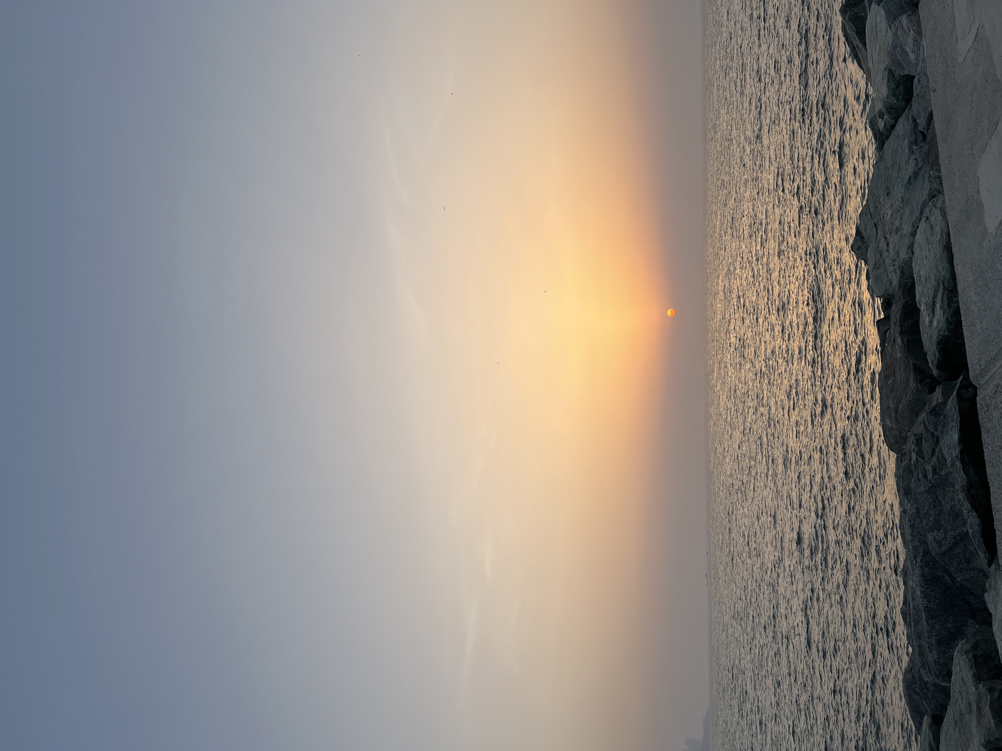 Hazy sunset observed over Dubai coastline