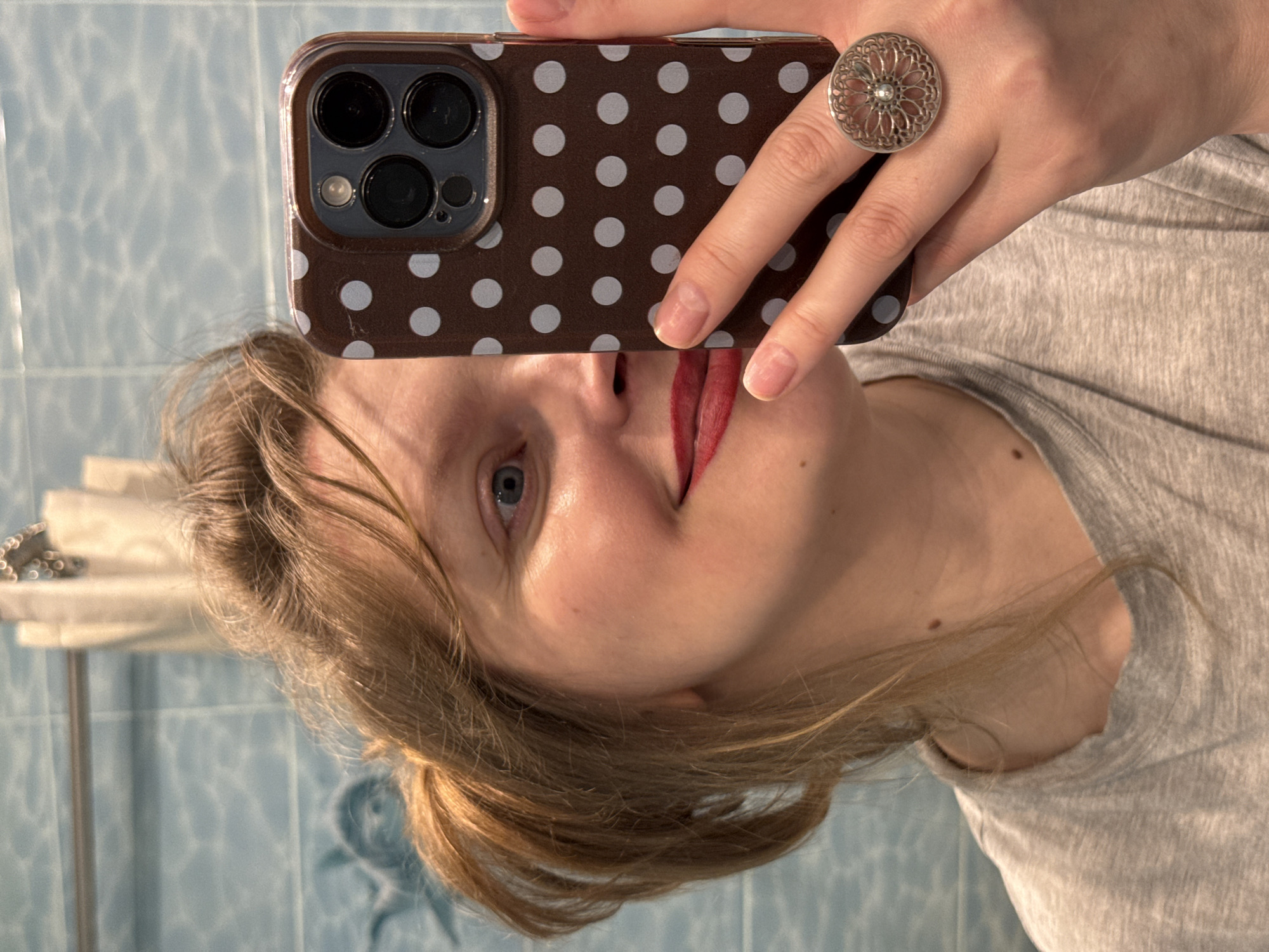 Selfie and cat photos captured in Izhevsk apartment