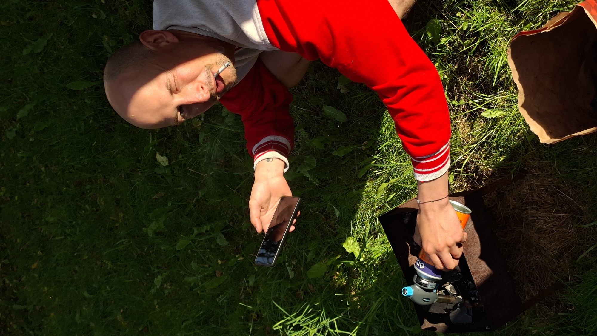 Backyard barbecue gathering in rural Belarus countryside
