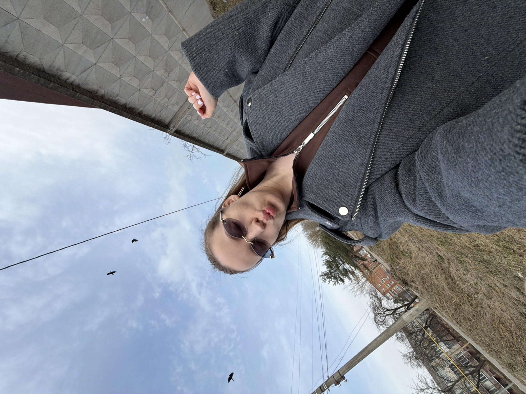 Woman takes morning selfies with baby in Reshetnikovo