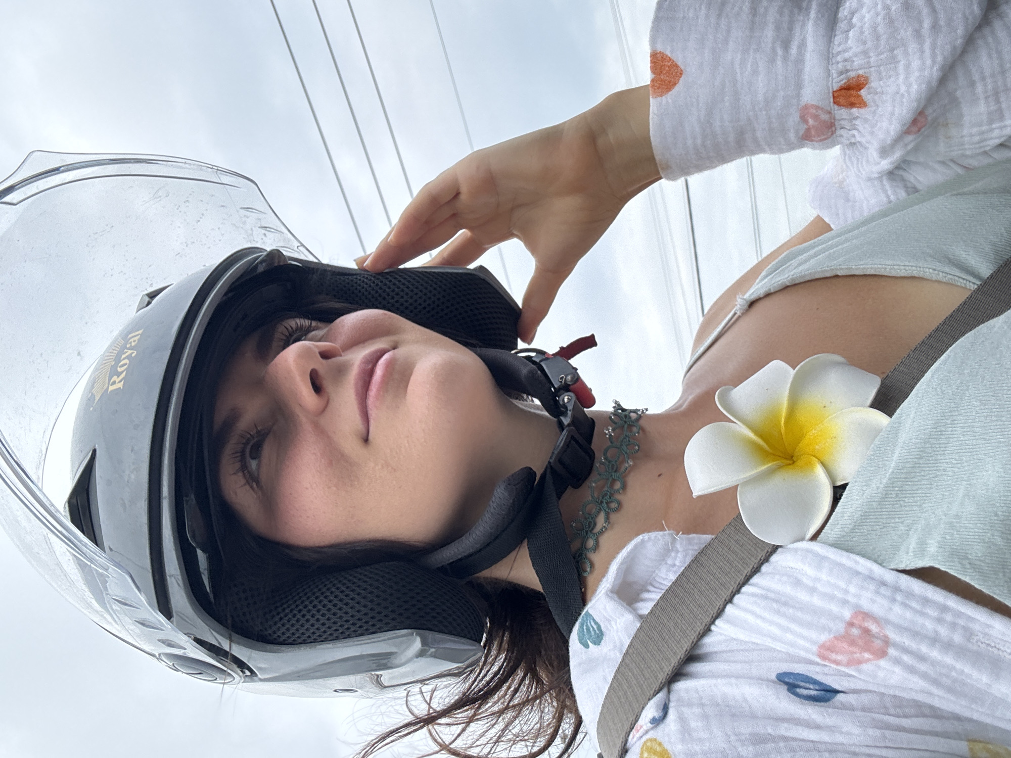 Woman photographed in motorcycle helmet in Mũi Né, Vietnam