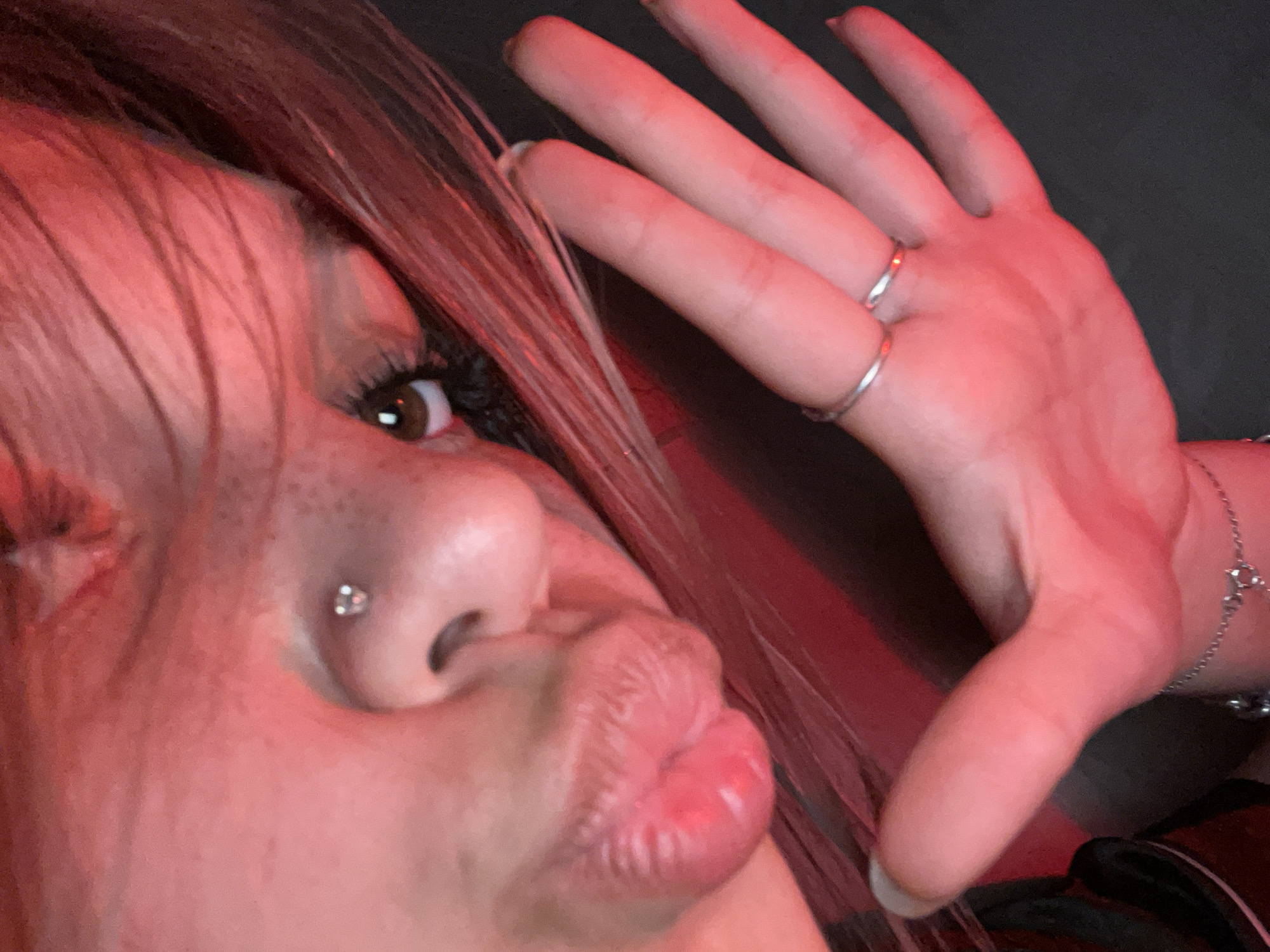 Photography session with red lighting captured in Saint Petersburg