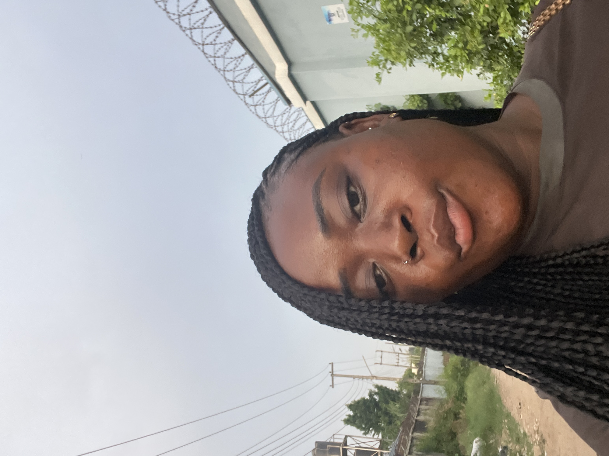 Daily life unfolds across Abuja streets on April afternoon