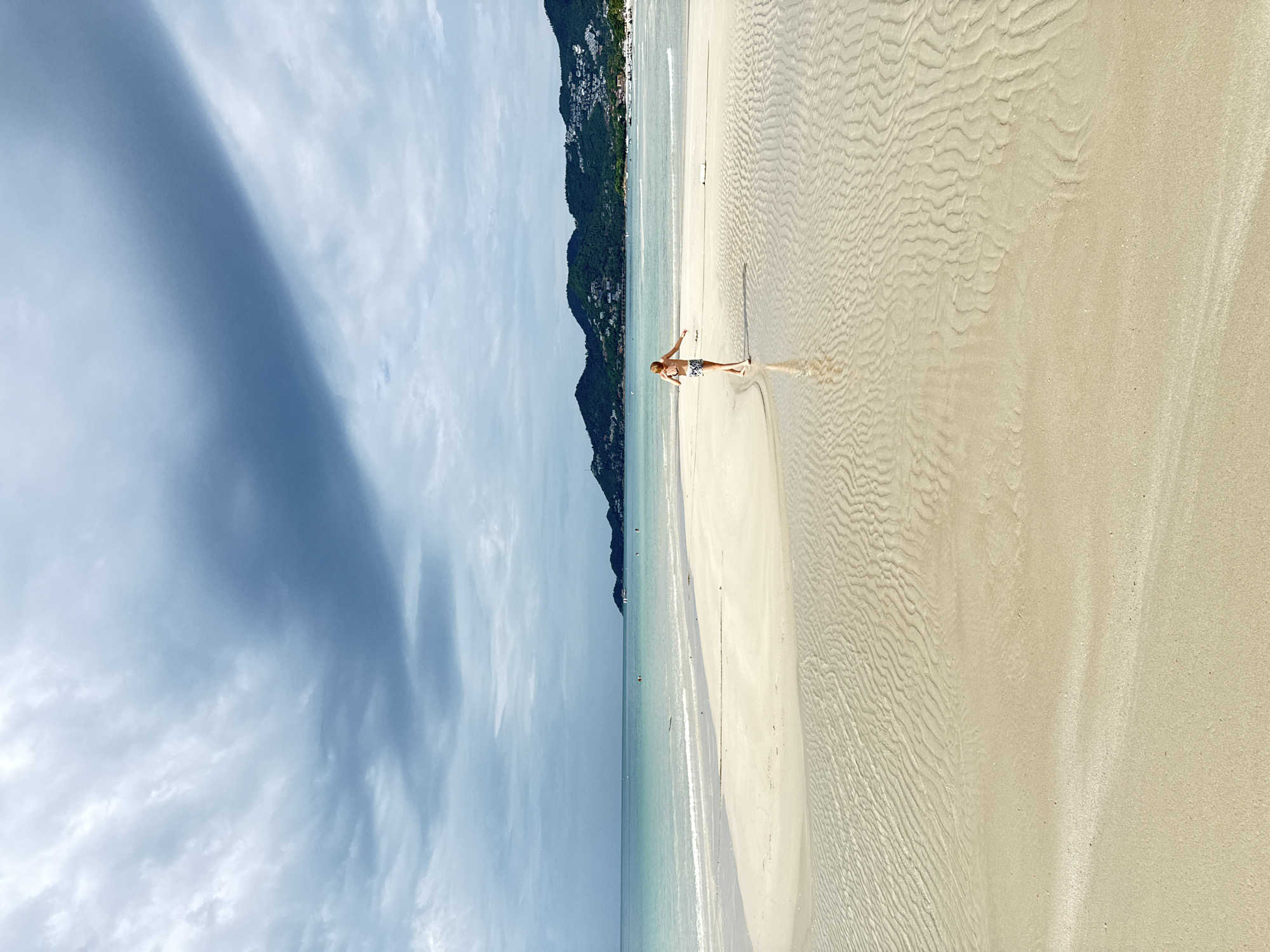 Cloudy morning on Ko Samui beach, inflatables in tow