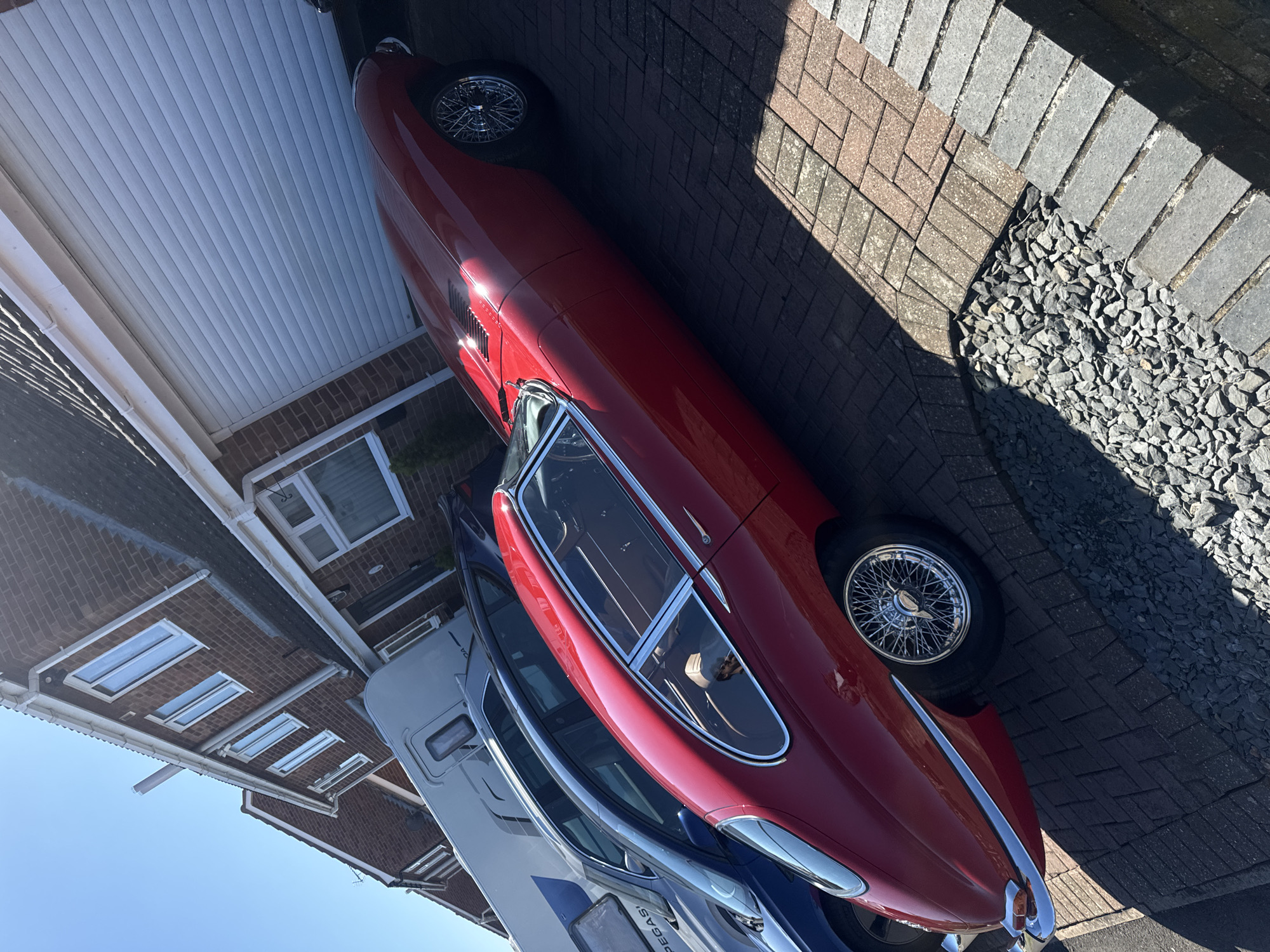 Classic red Jaguar E-Type spotted on Lincolnshire driveway