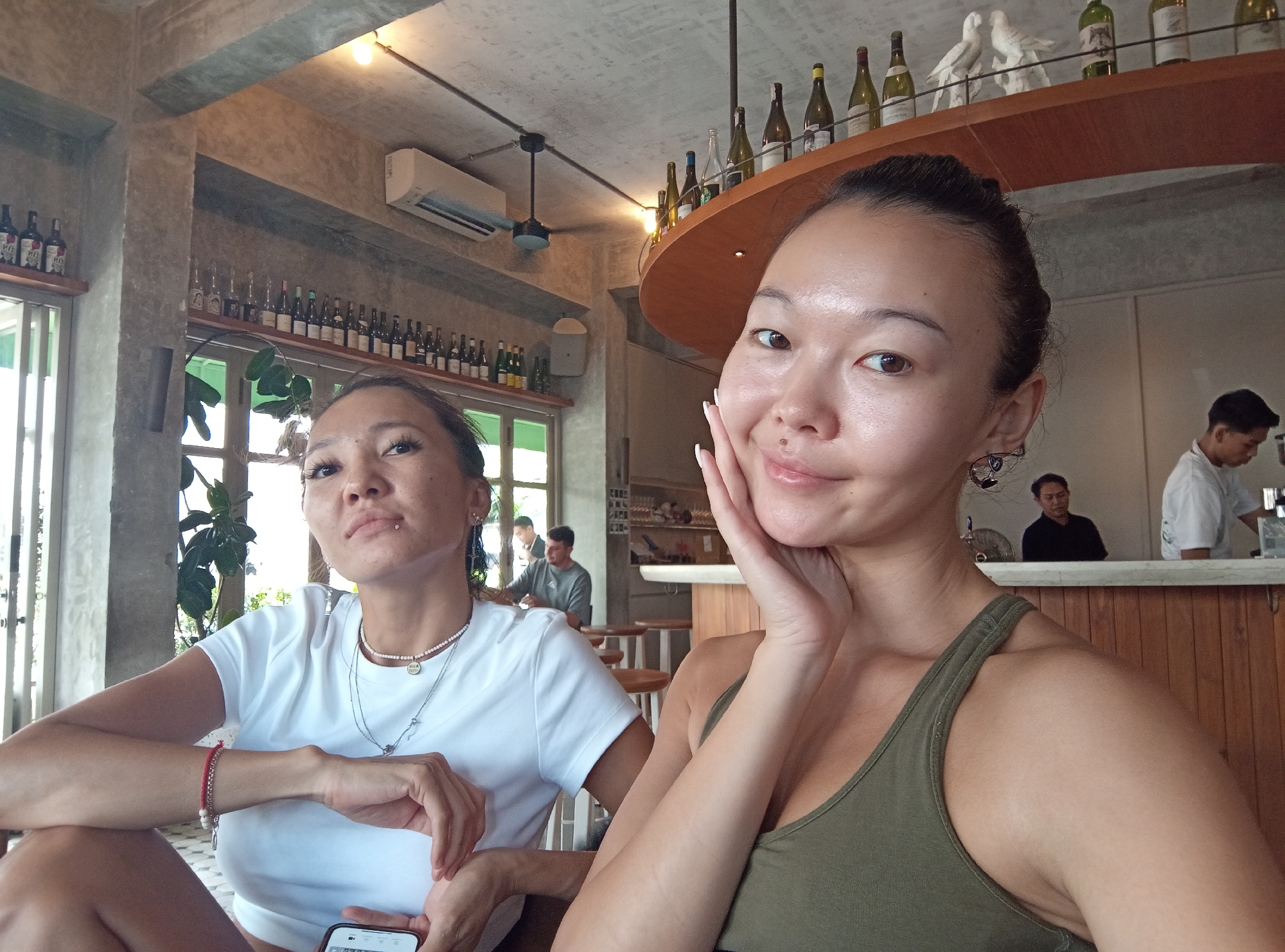 Women dine and socialize at Mengwi restaurant early morning