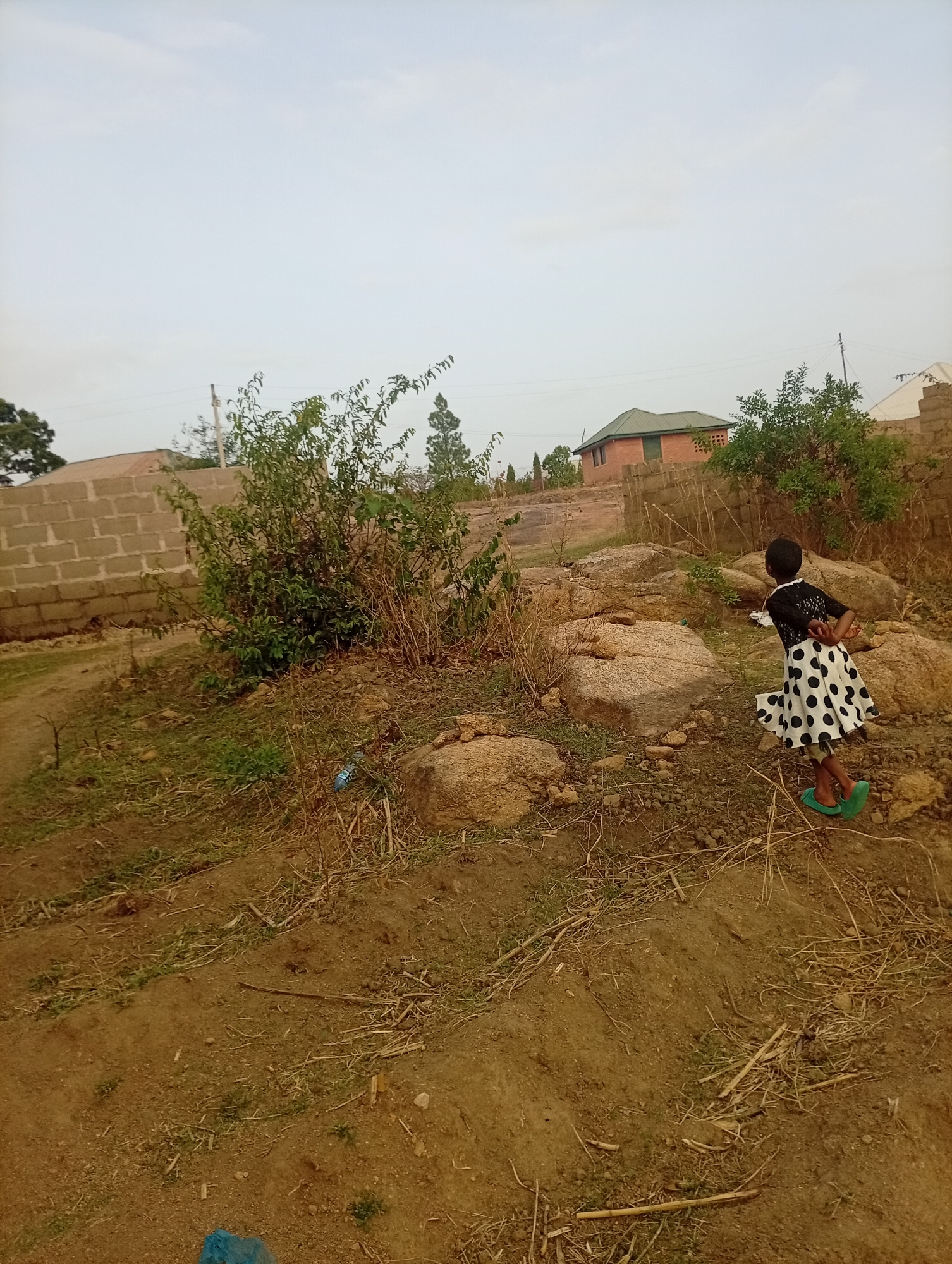 Construction and daily life scenes documented across Jos, Nigeria