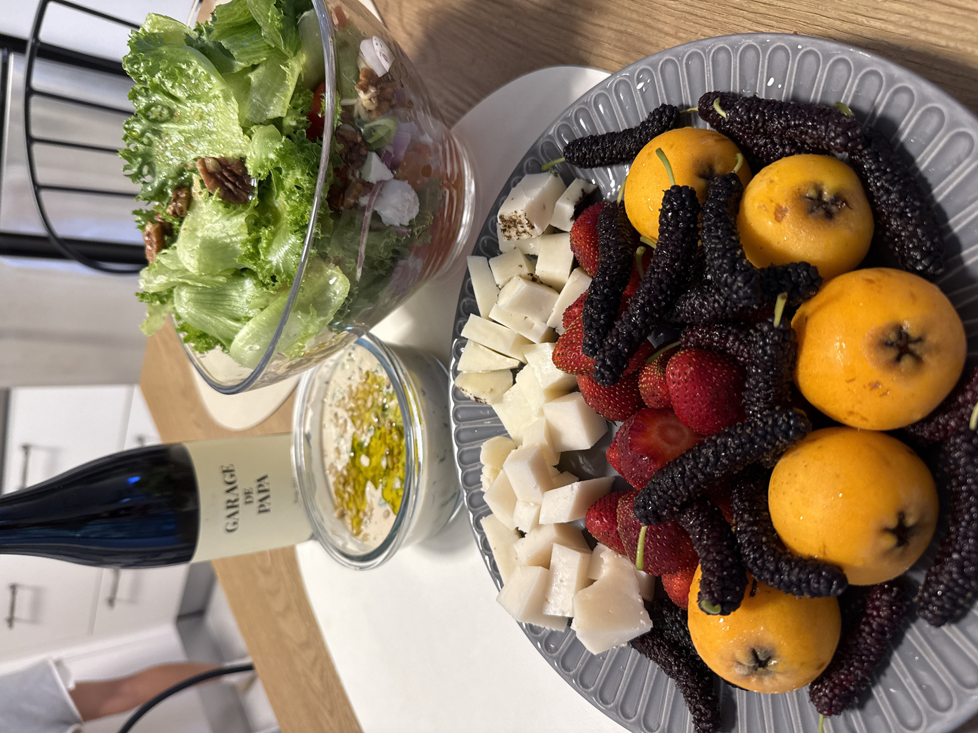 Wine and food arrangement documented in Herzliya dining setting